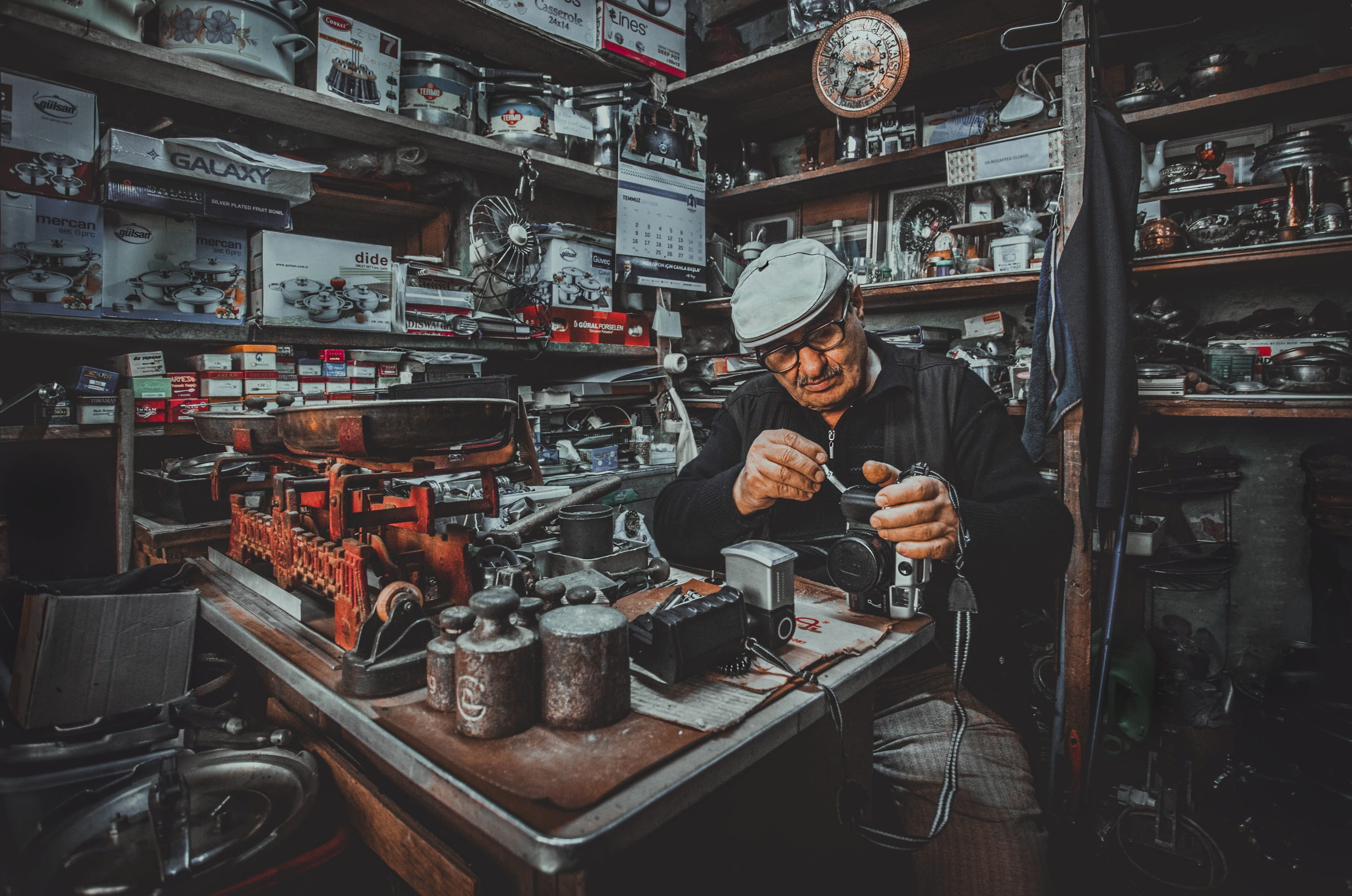 women, nostalgic photo karabulut, indoors, photographer, repairman, small business, business, standing, 2K, ragman, historic, retail display, front view, HD Wallpaper