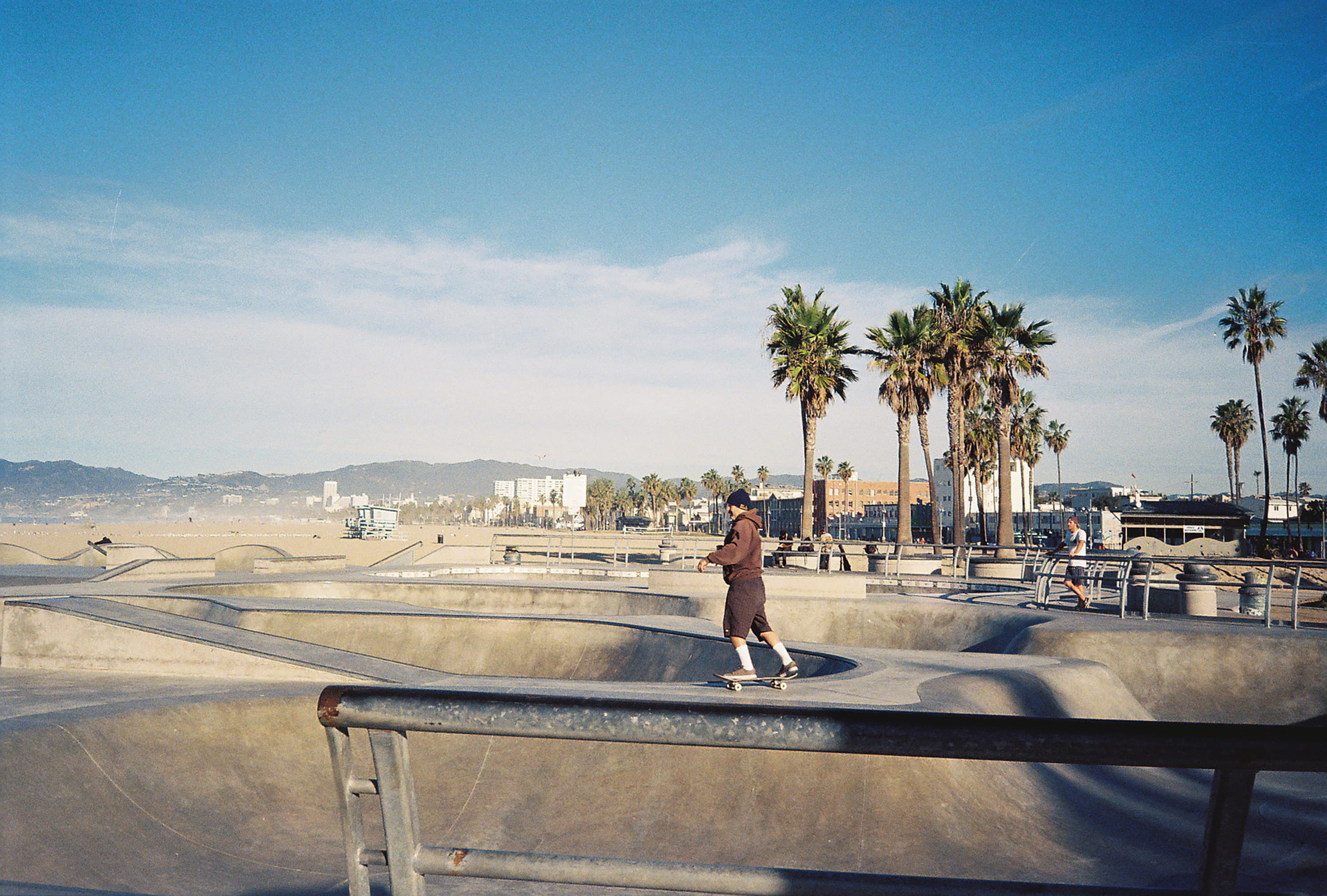 skate park, outdoors, la, architecture, day, young adult, palm tree, full length, city, ca, tree, skater, standing, sunlight, beach, skateboard, tropical climate, HD Wallpaper