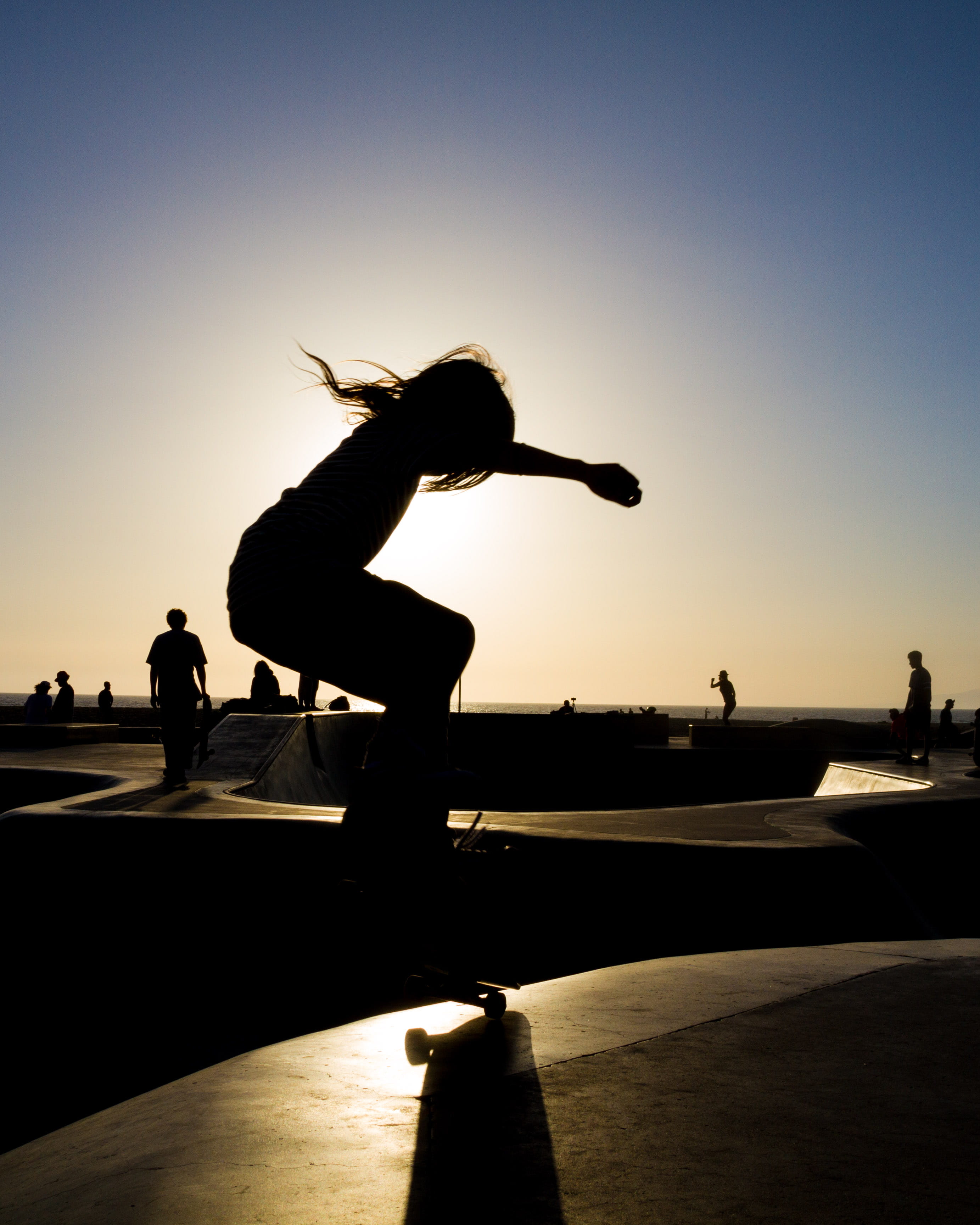 skateboard park, sky, sunset, incidental people, real people, 2K, lifestyles, human arm, leisure activity, adventure, person, sunlight, sport, leisure activities, Phone HD Wallpaper