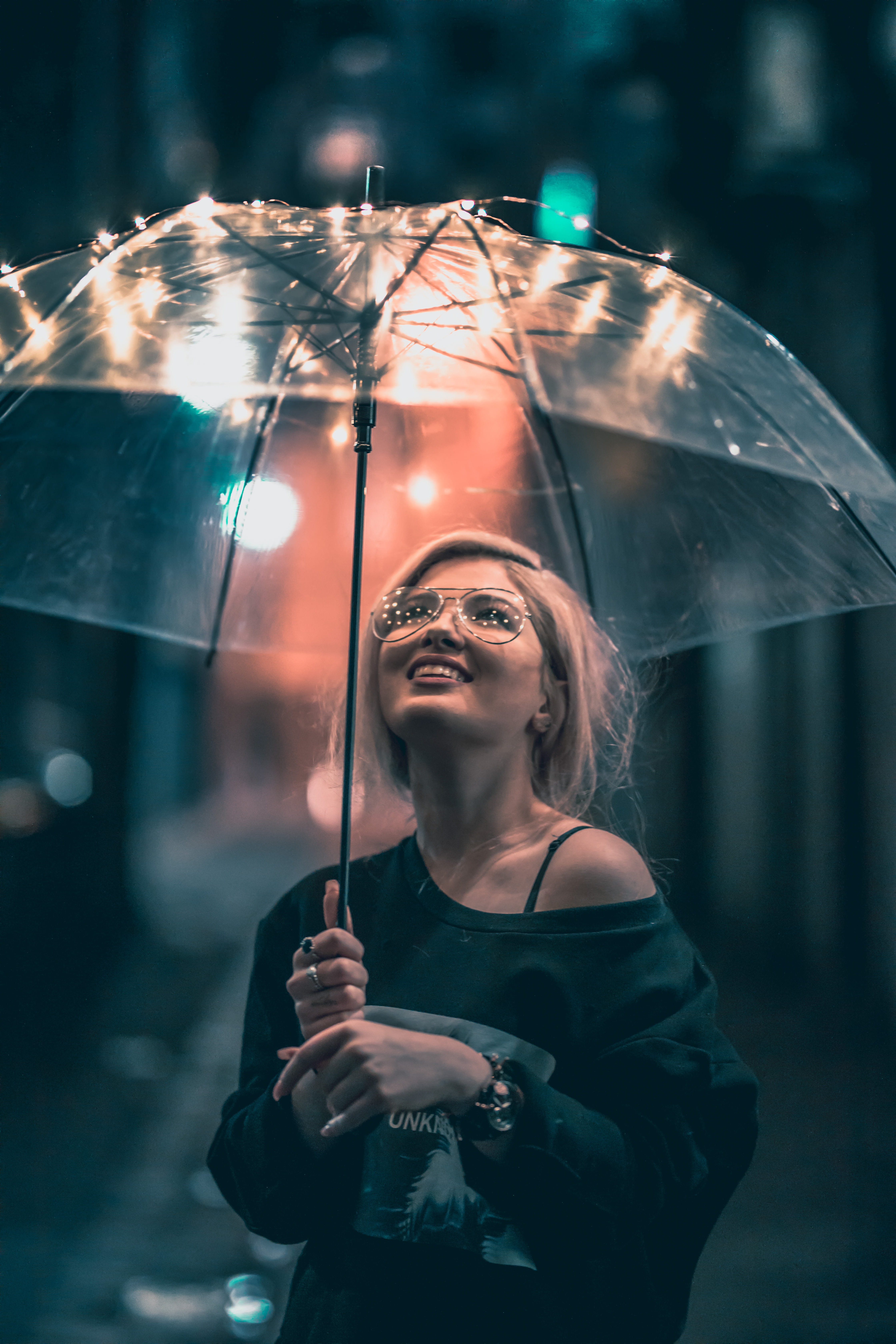 leisure activity, dark, women, young adult, woman, real people, night, lights, one person, model, focus on foreground, glasses, rain, clear, females, fairy light, Phone HD Wallpaper