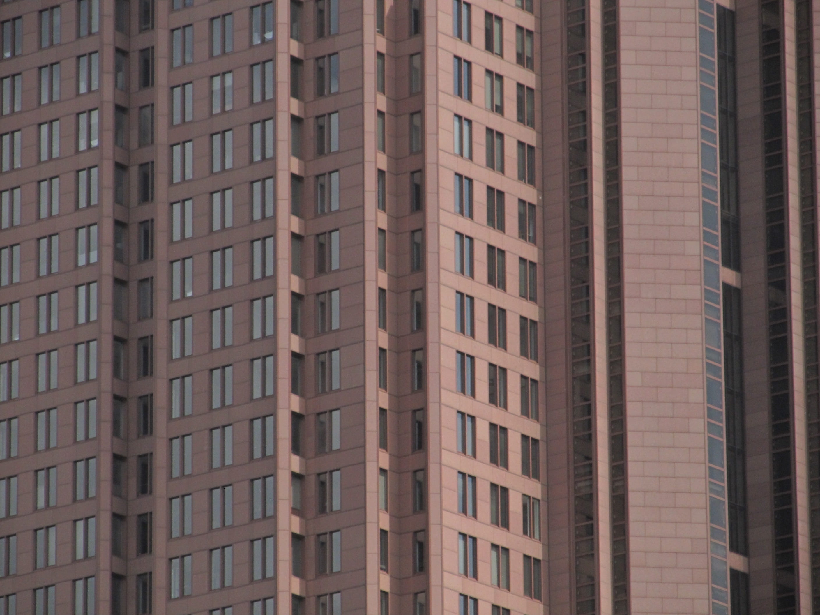 day, city, no people, tower, 2K, full frame, business, outdoors, commerce, building, corporate, built structure, window, repetition, facade, office building exterior, HD Wallpaper