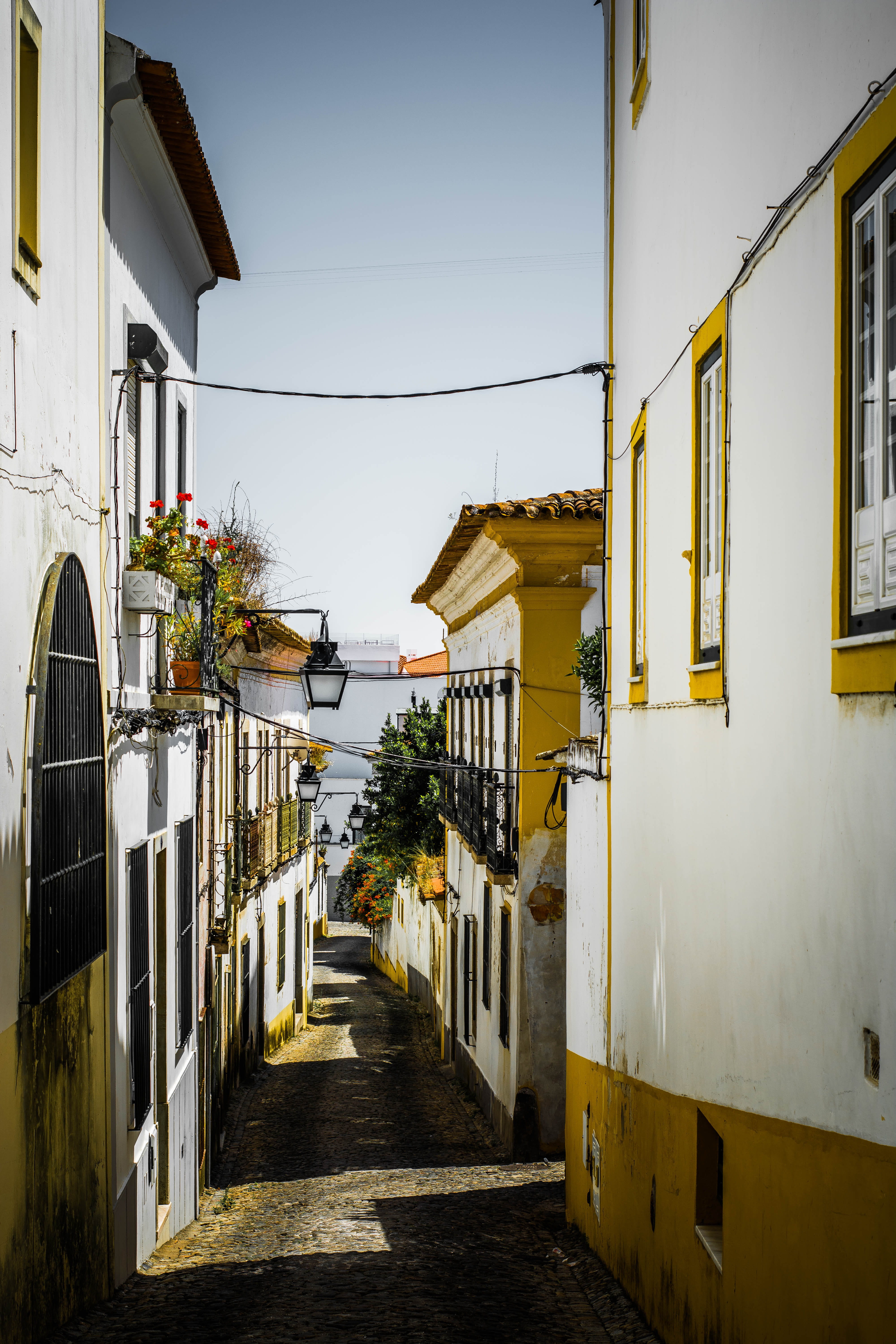 urban, long, no people, gray, building, street view, 5K, daytime, direction, house, landscape, outdoors, portugal, road, the way forward, street, alleyway, Phone HD Wallpaper