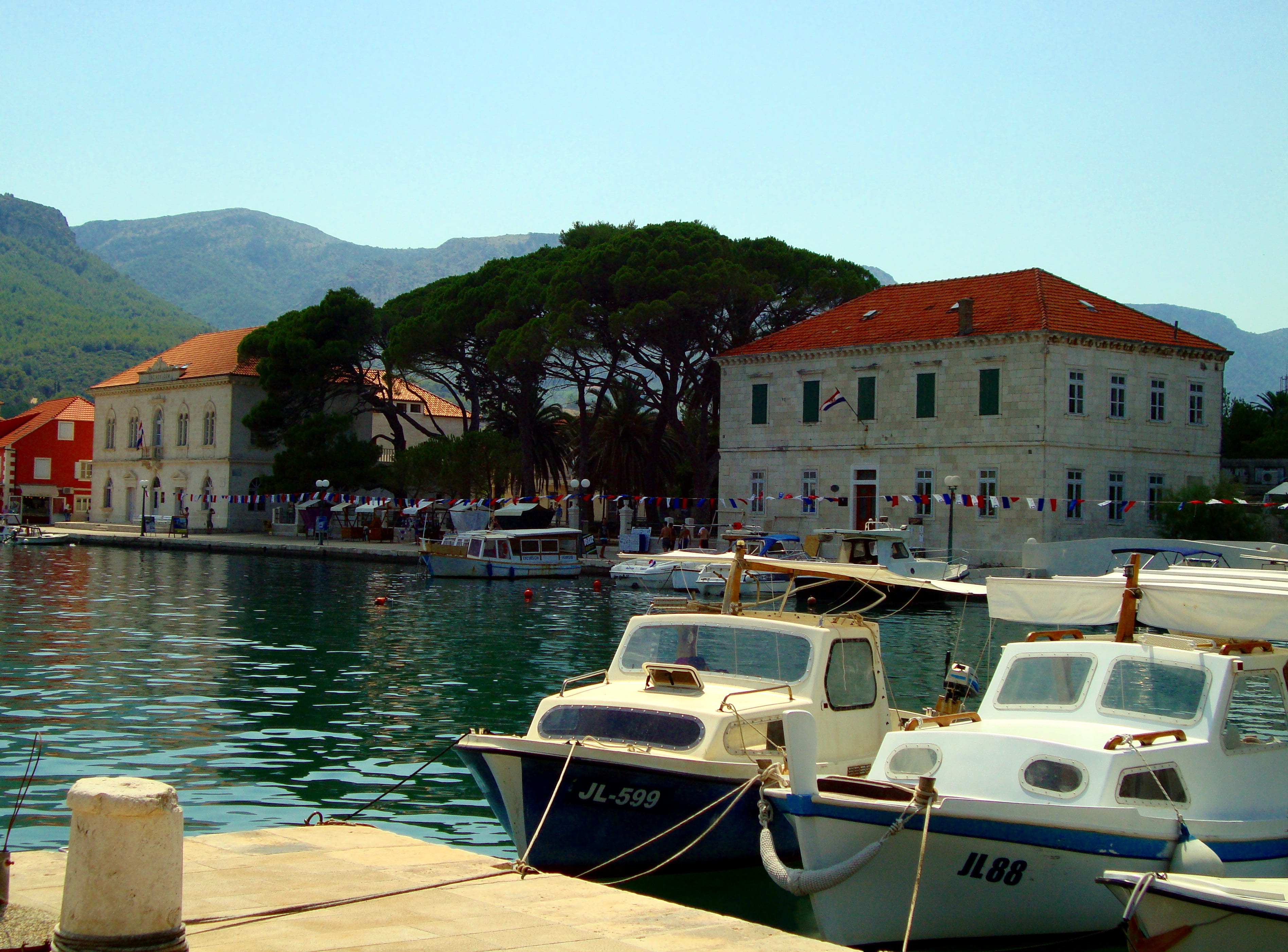 hvar, town, croatia, 2K, harbour, city, river, building exterior, riverside, mode of transportation, mountains, near, sky, tourism, boat, day, architecture, HD Wallpaper