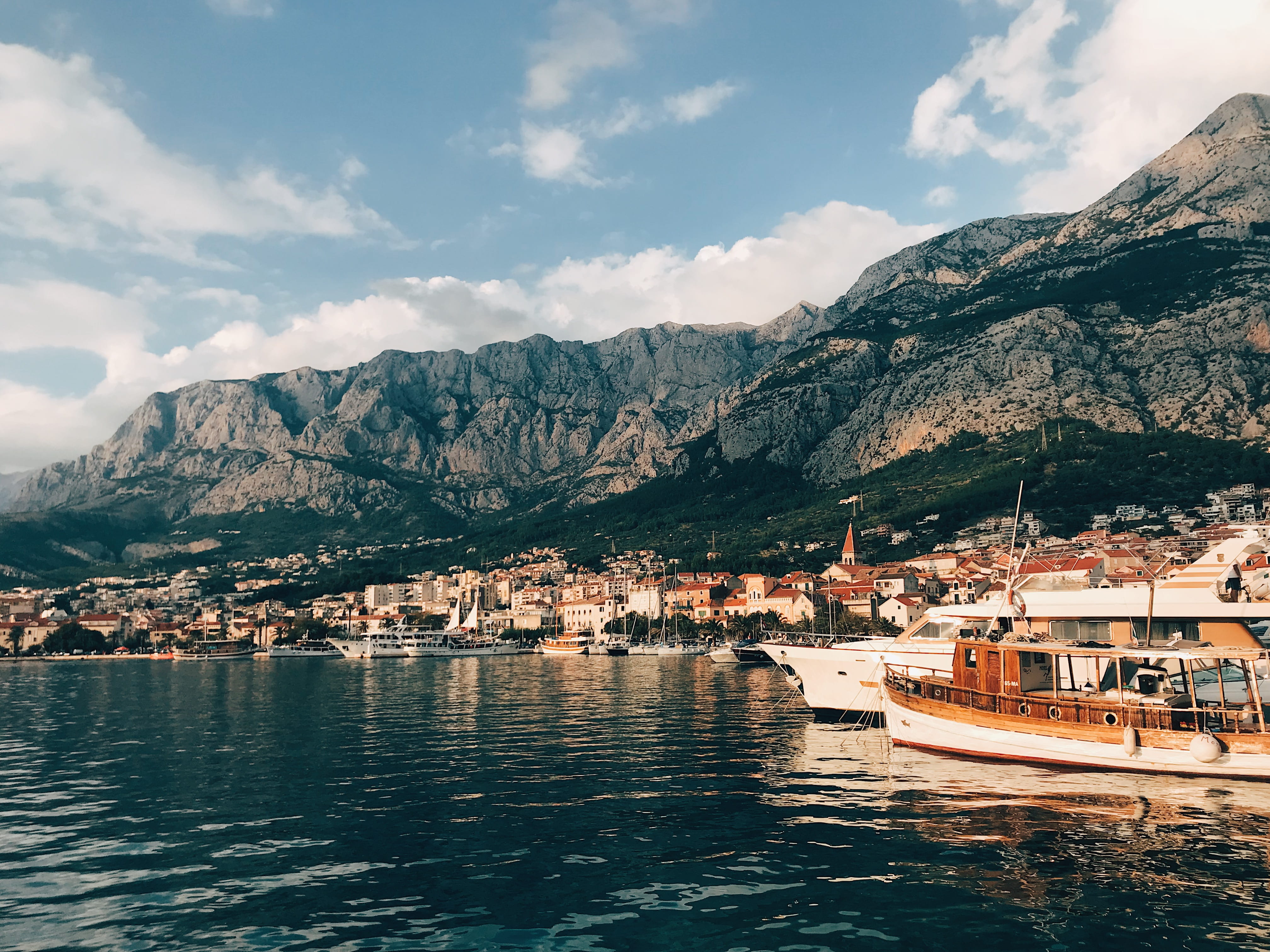 boats, mountain range, sky, body, scenics - nature, mode of transportation, concrete, building exterior, rocks, water, building, outdoors, clouds, docked, HD Wallpaper
