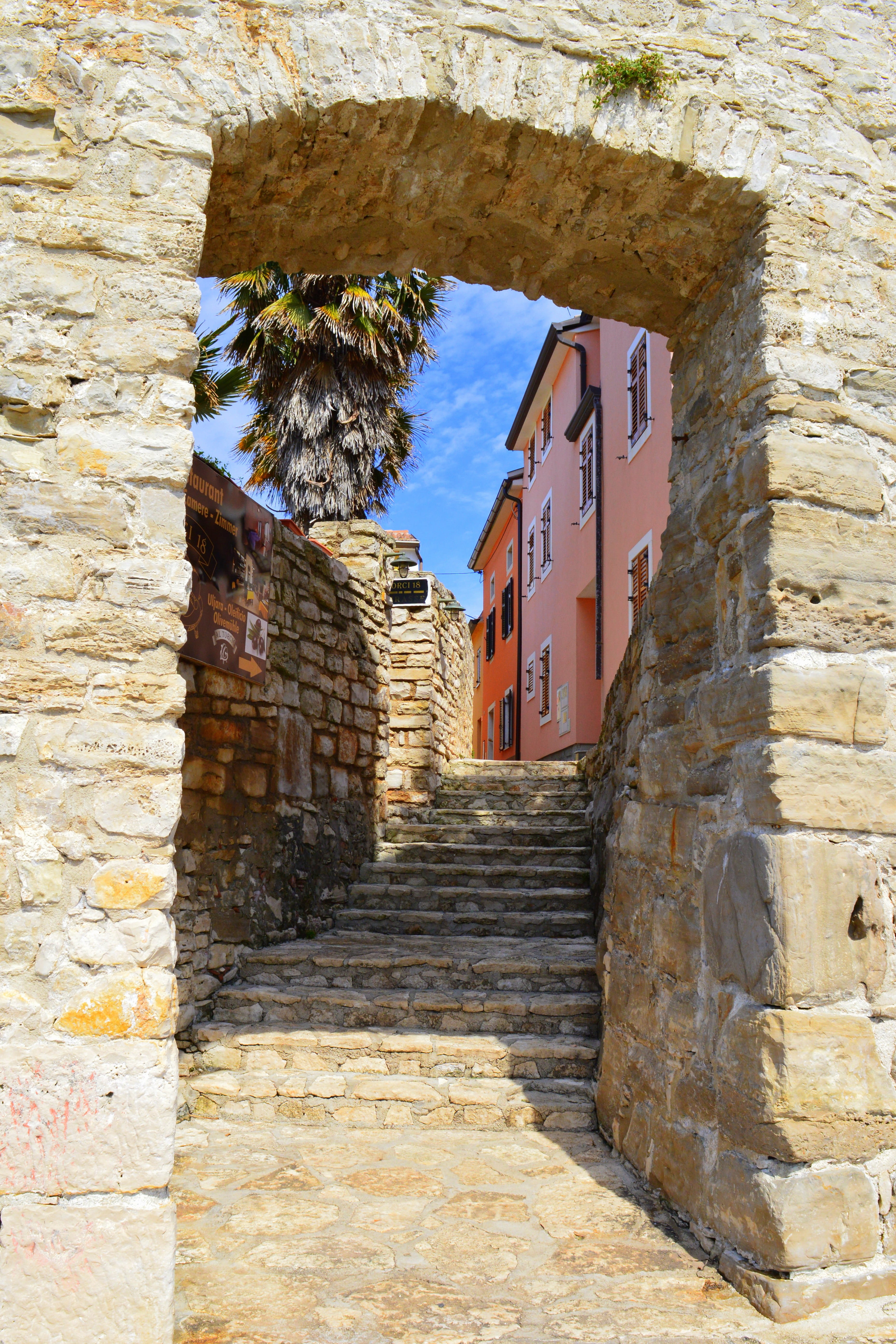 the streets, door, sunlight, tour, entrance, the past, building, no people, stone wall, history, city, outdoors, old, the coast, staircase, tourism, wall, Phone HD Wallpaper