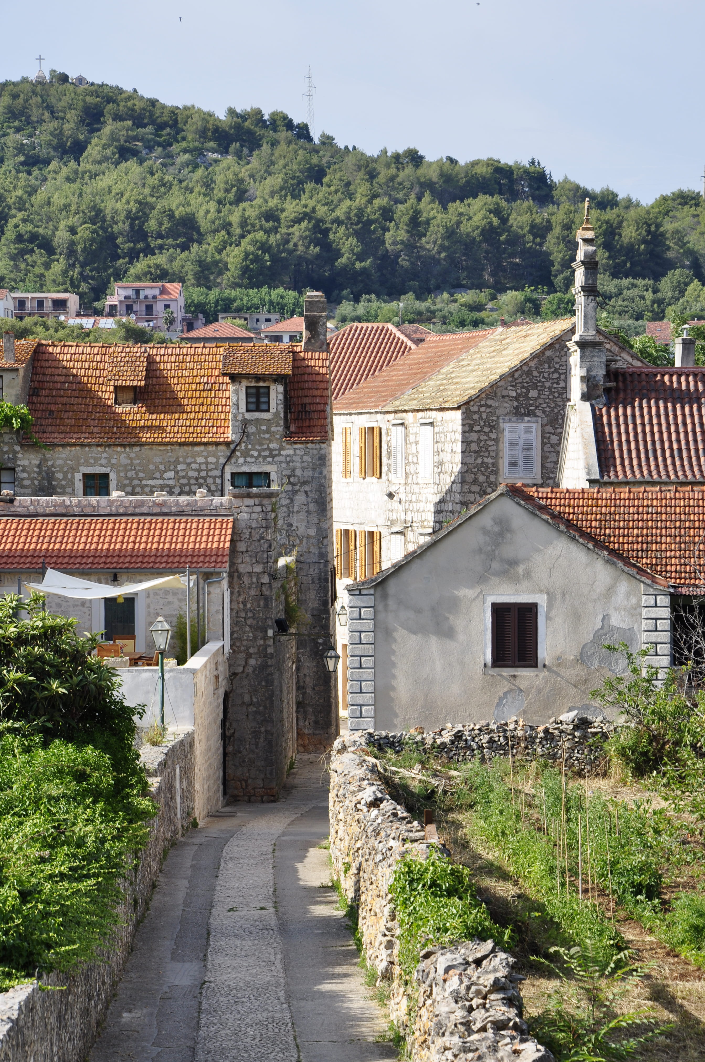 travel, roof, no people, townscape, day, building, footpath, sunlight, the way forward, islandlife, rural, roof tile, residential district, house, town, Phone HD Wallpaper