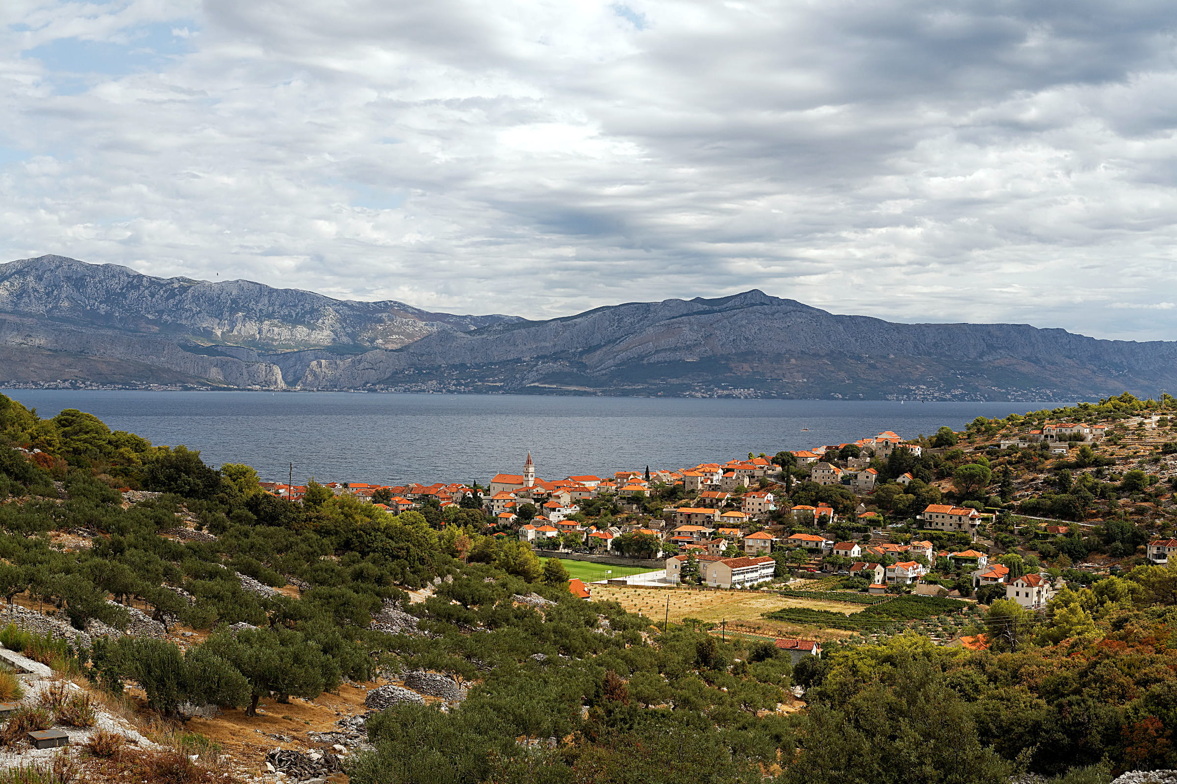 nature, city, architecture, sea, island, built structure, europe, small, tourism, outdoors, village, environment, day, building, landscape, mountain, cloud - sky, HD Wallpaper