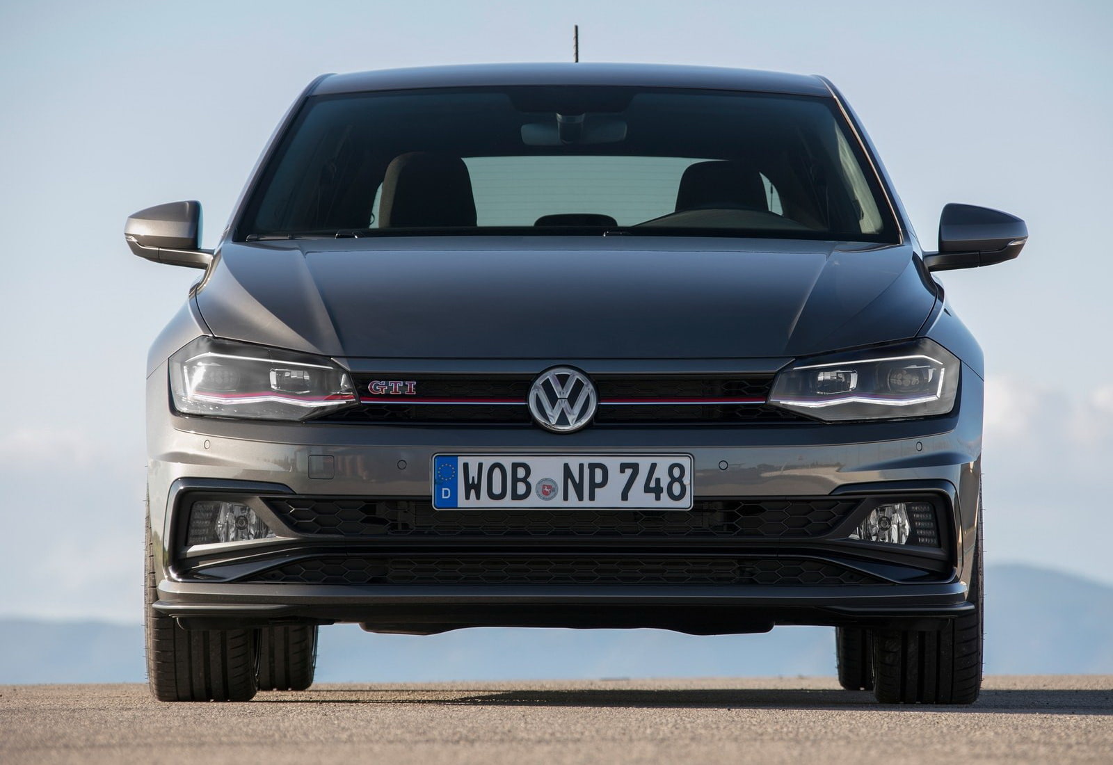 no people, 720P, text, polo, gti, landscape, day, sky, blue, stationary, mode of transportation, transportation, car, western script, nature, motor vehicle, HD Wallpaper