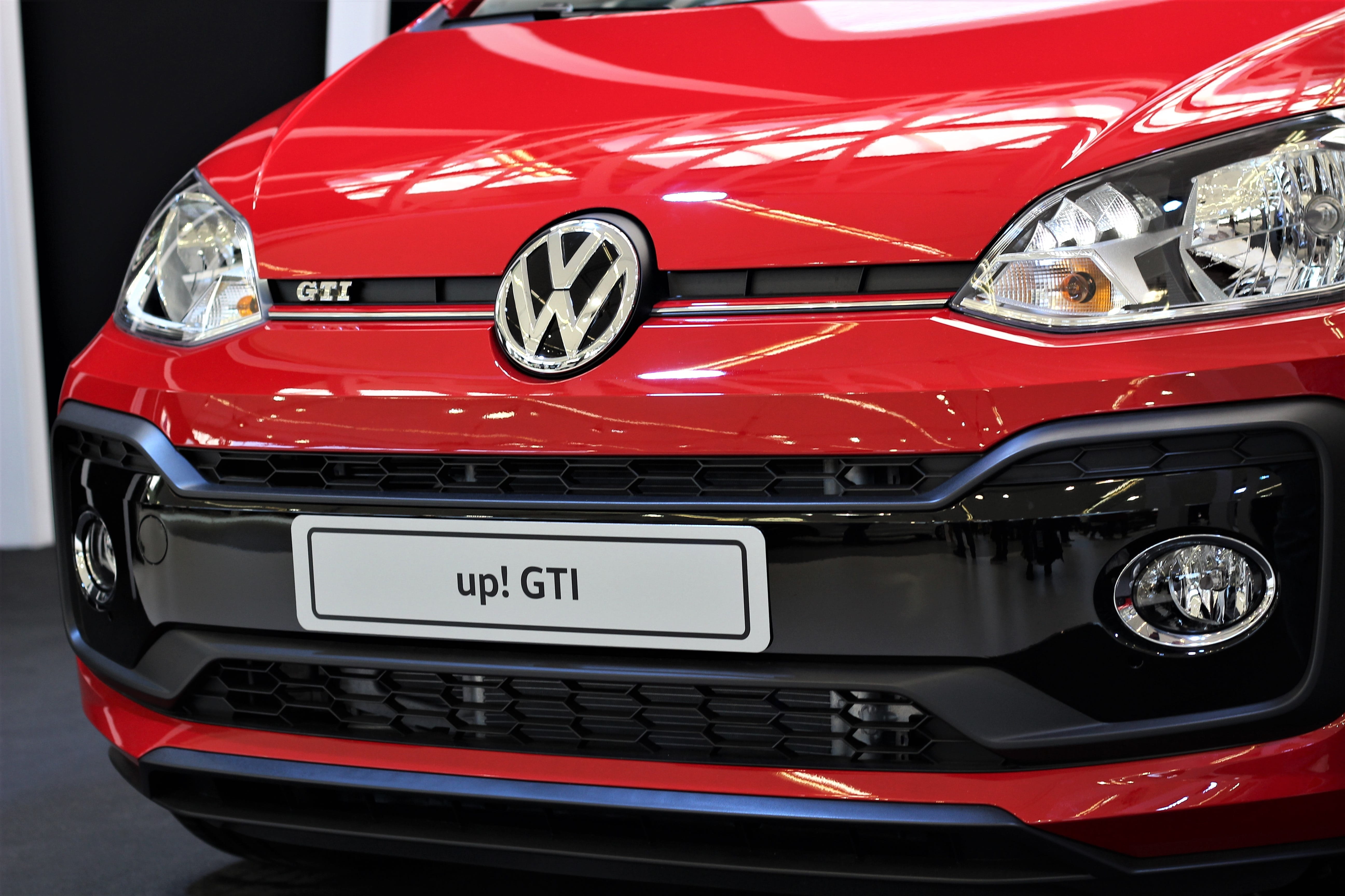 red, day, auto show zagreb 2018, land vehicle, close-up, metal, transportation, city, retro styled, volkswagen up, public show, car, shiny, headlight, wealth, HD Wallpaper