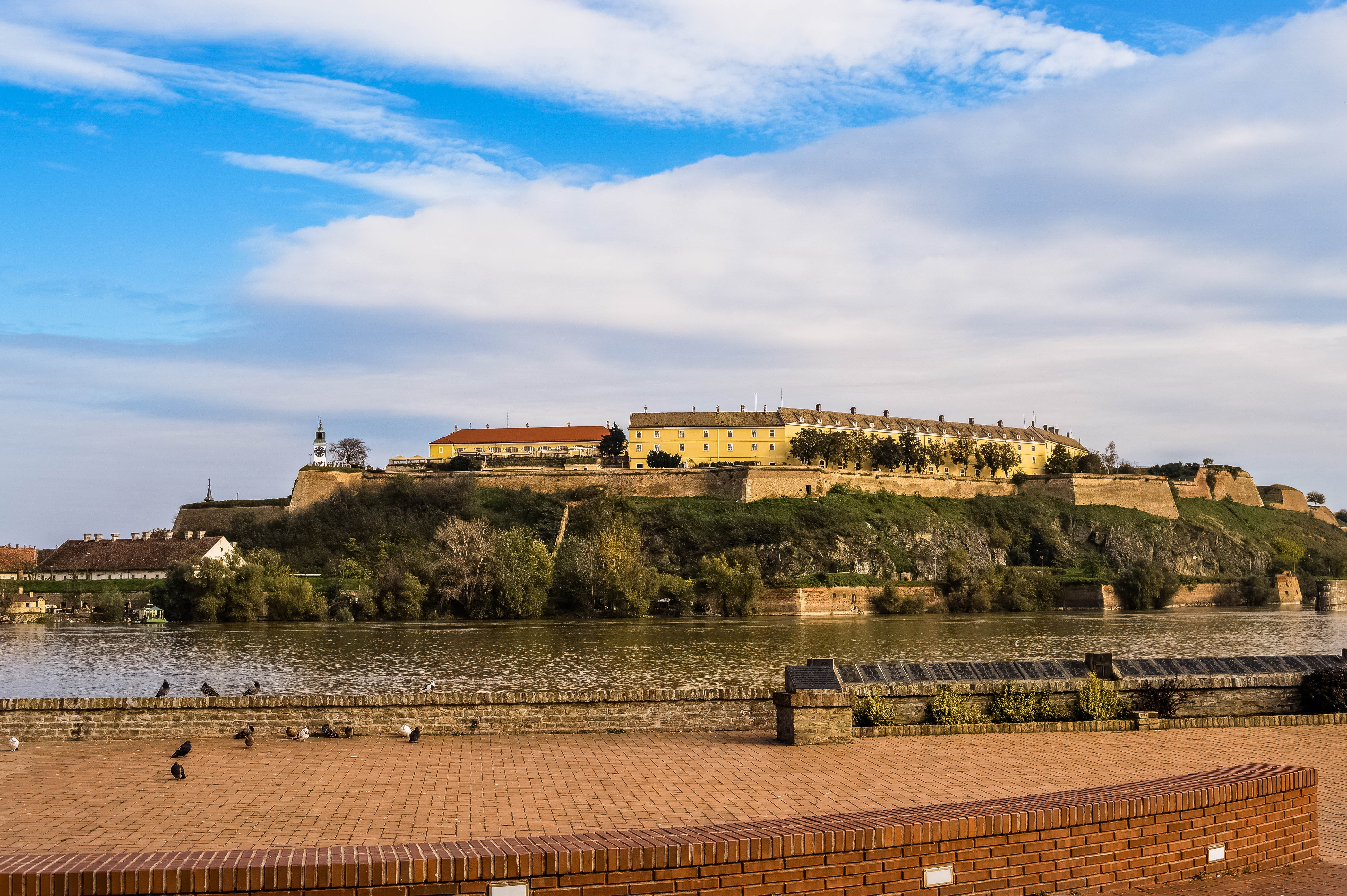 petrovaradin, castle, body, 5K, building exterior, outdoors, waterfront, plant, danube river, travel destinations, river, serbia, concrete, nature, city, HD Wallpaper