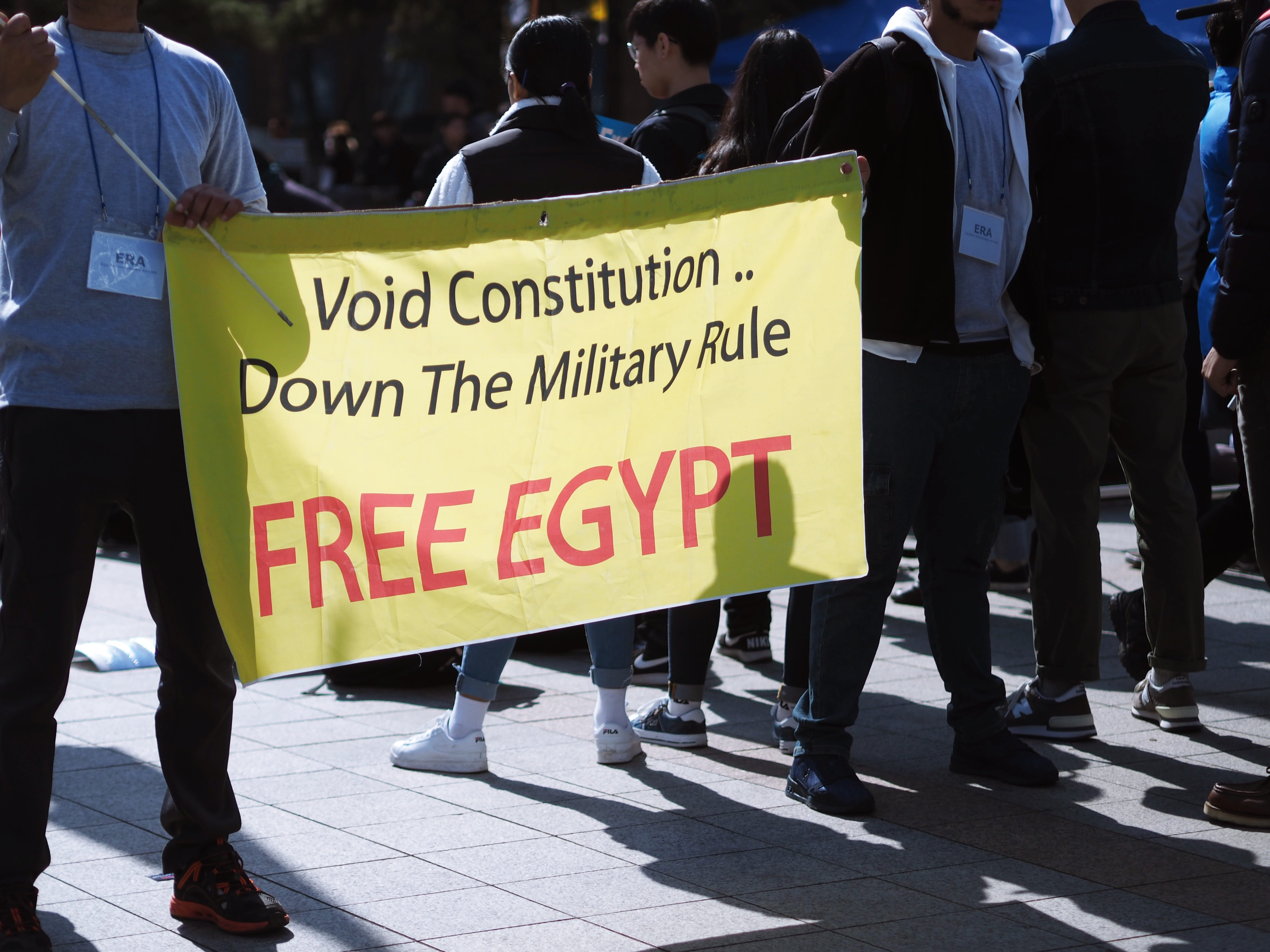 overcoat, day, communication, crowd, real people, person, men, egypt, footwear, architecture, apparel, group of people, text, protest, human, western script, HD Wallpaper