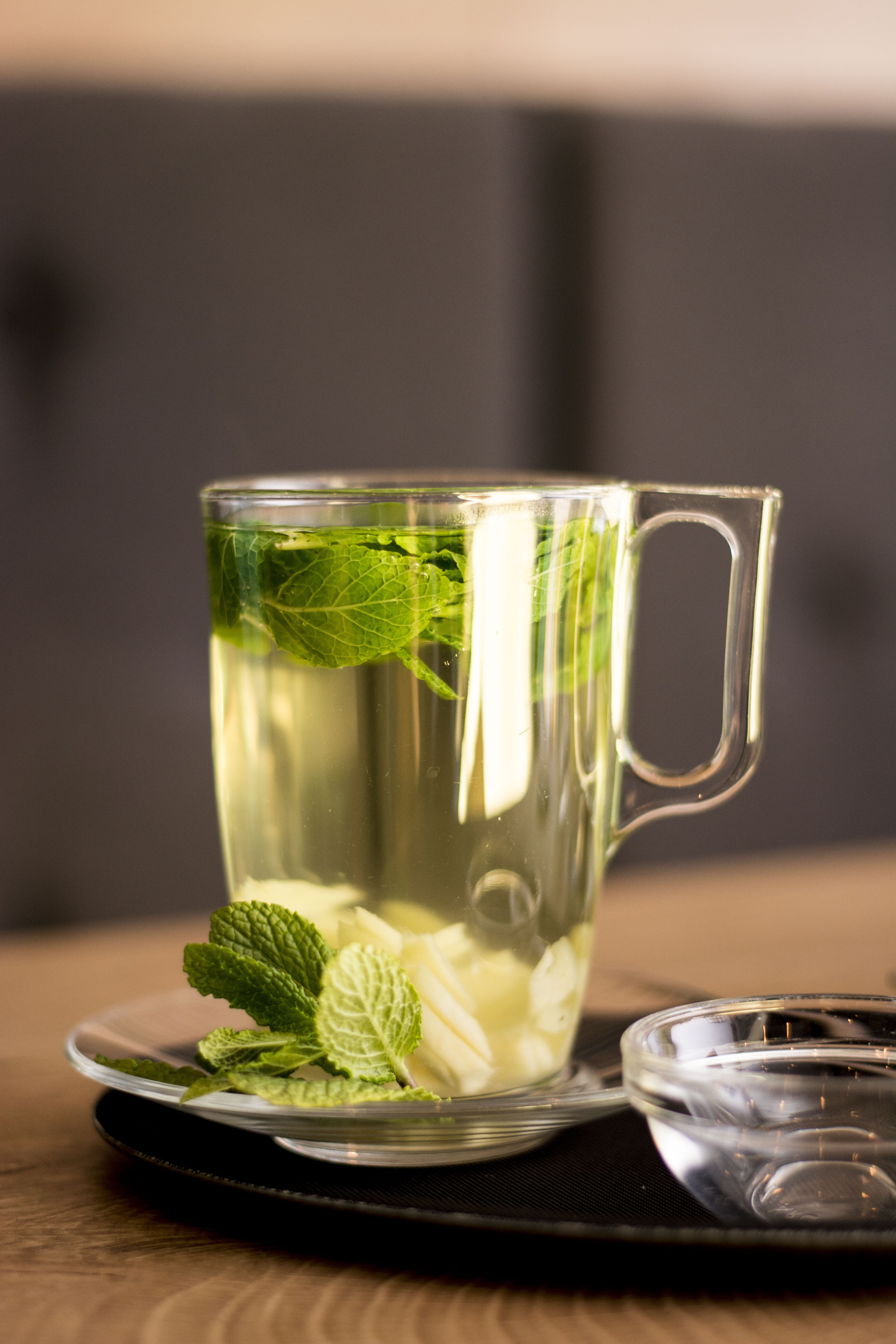 indoors, mint, leaf, table, tea cup, glass, mug, saucer, nutrition, household equipment, drink, drinking glass, herbal tea, 5K, food, close-up, tea - hot drink, Phone HD Wallpaper
