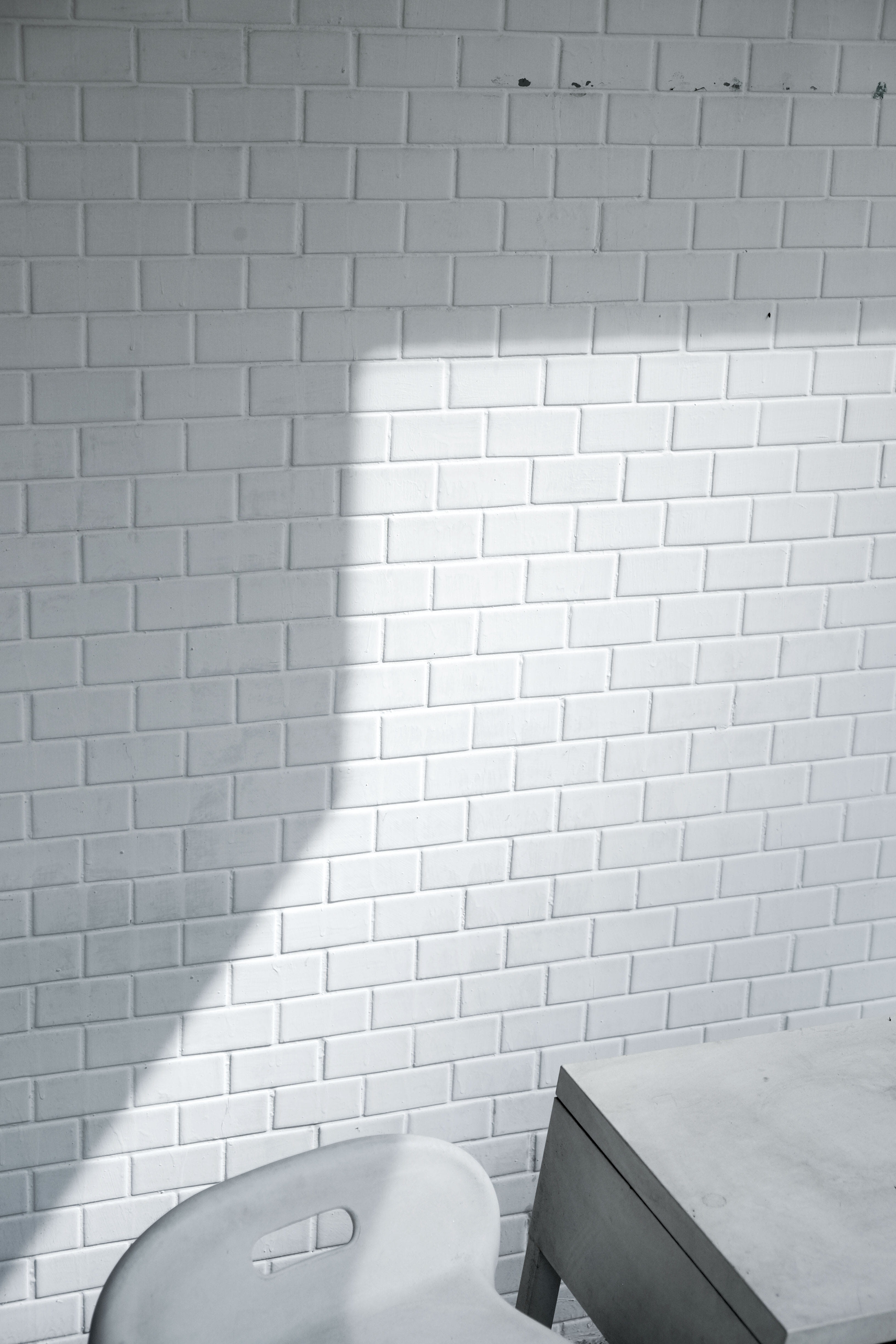 white, near, empty, wall - building feature, seat, no people, cement, still life, black-and-white, absence, brick wall, room, flooring, minimalism, architecture, Phone HD Wallpaper