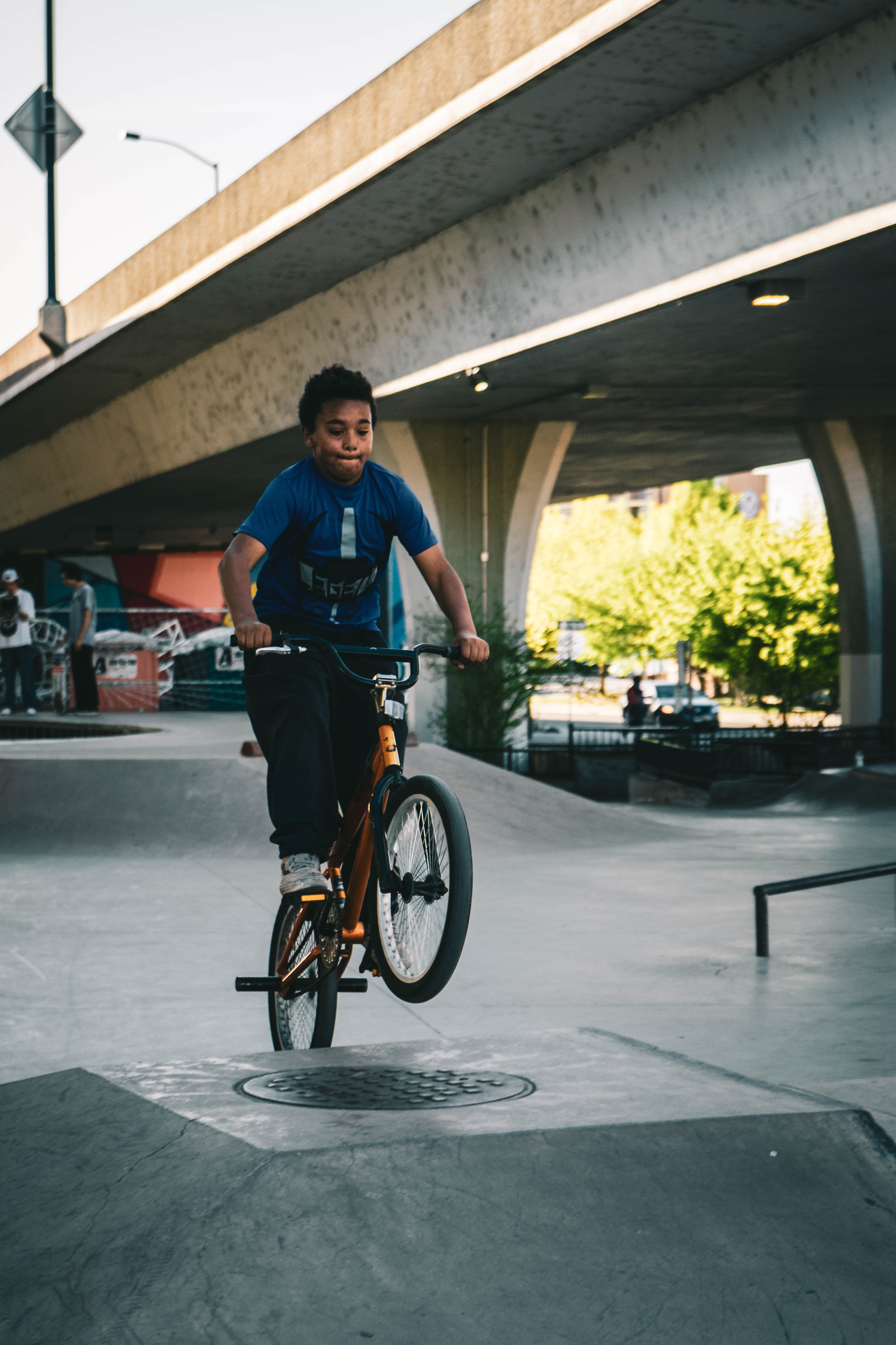 pavement, leisure activity, person, shirt, fun, riding, road, active, daylight, built structure, park, young adult, architecture, recreation, casual clothing, Phone HD Wallpaper
