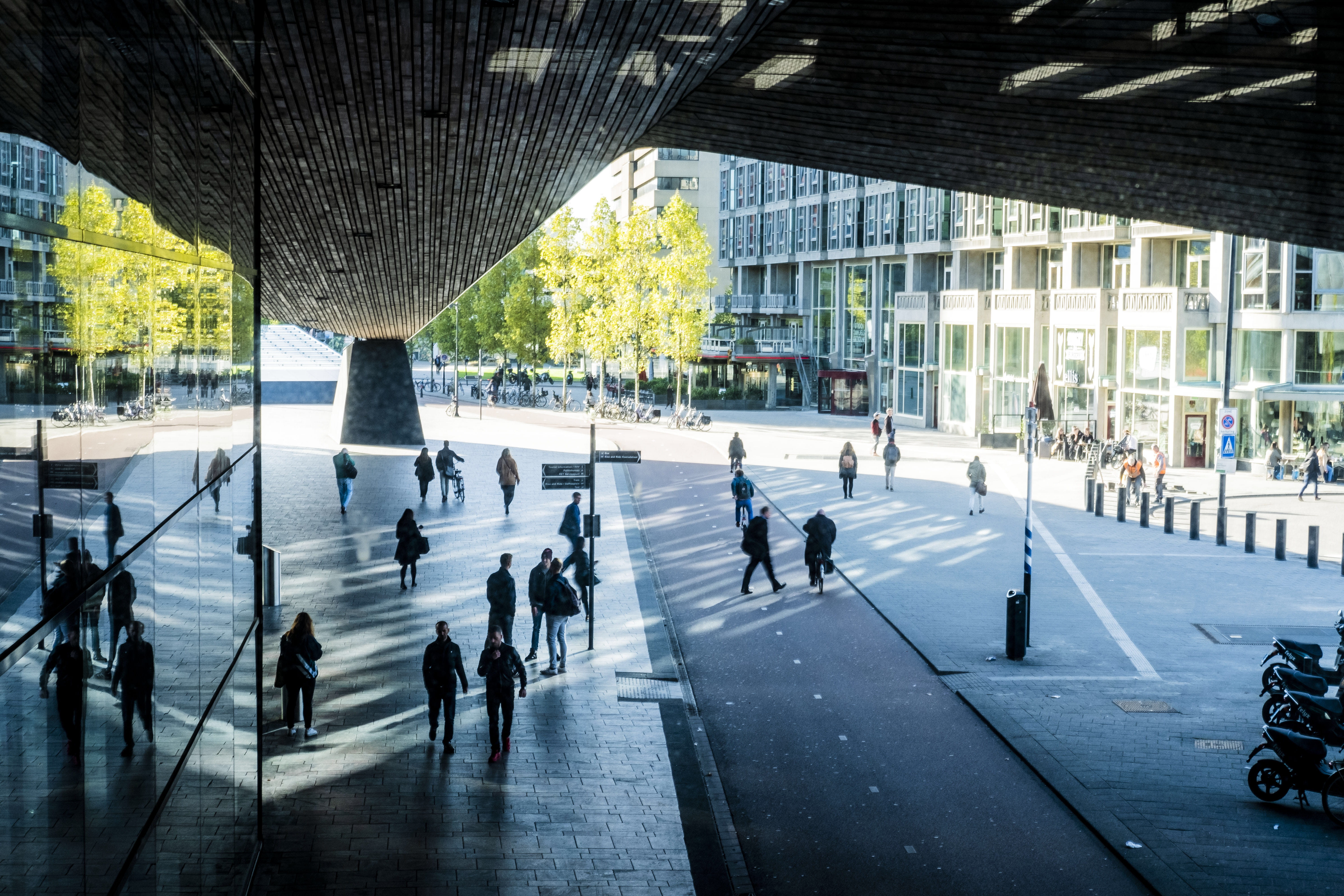 street, city life, nature, airport terminal, 5K, city, built structure, walking, wall, building exterior, real people, shadow, people, architectural column, HD Wallpaper