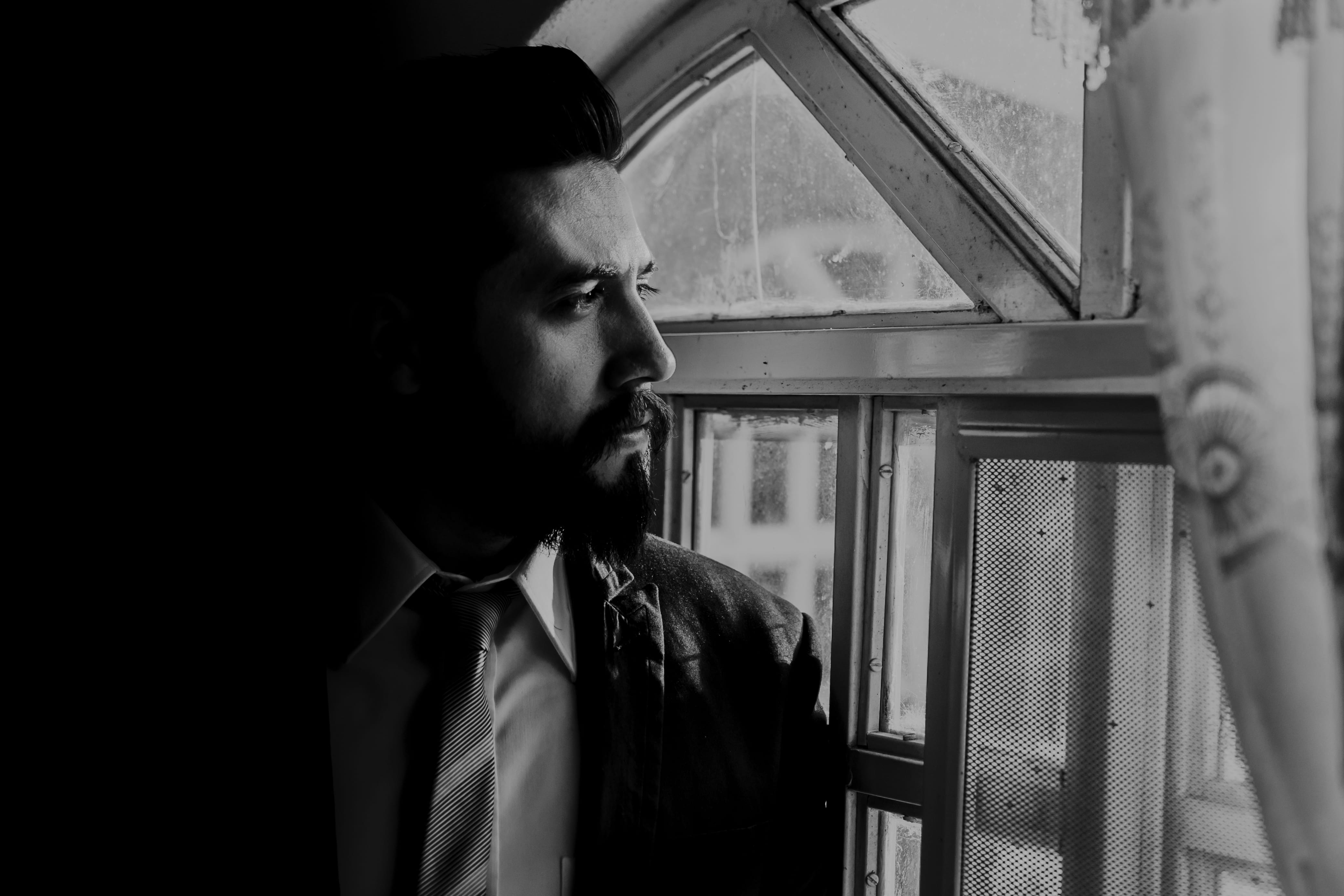 people, menswear, mexico, glass, lifestyles, young men, contemplation, indoors, male, sad, human, men, clothing, real people, coat, males, looking through window, HD Wallpaper