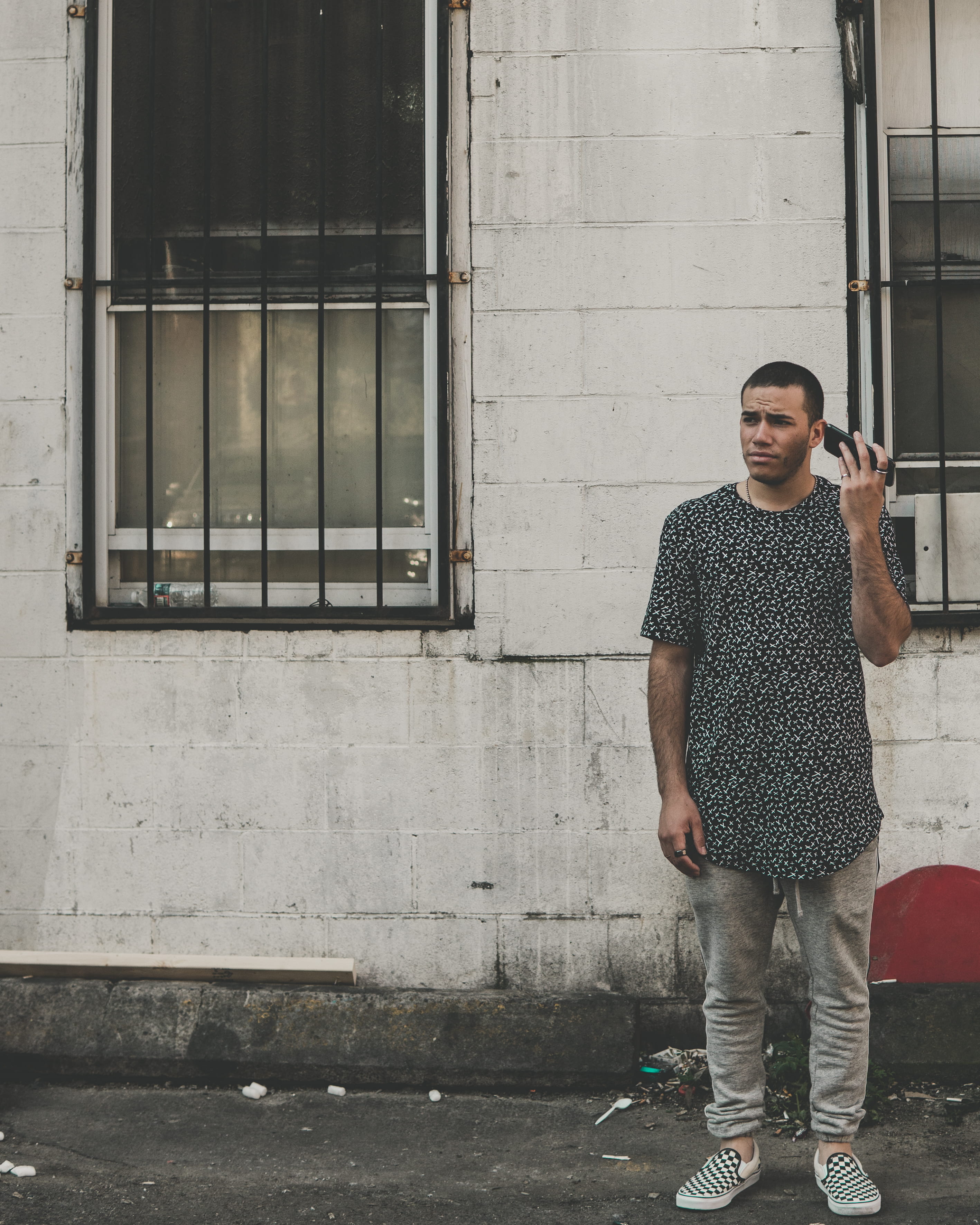 full length, one person, phone, mobile phone, wall, building exterior, architecture, front, young men, ear, near, building, technology, portrait, bars, Phone HD Wallpaper