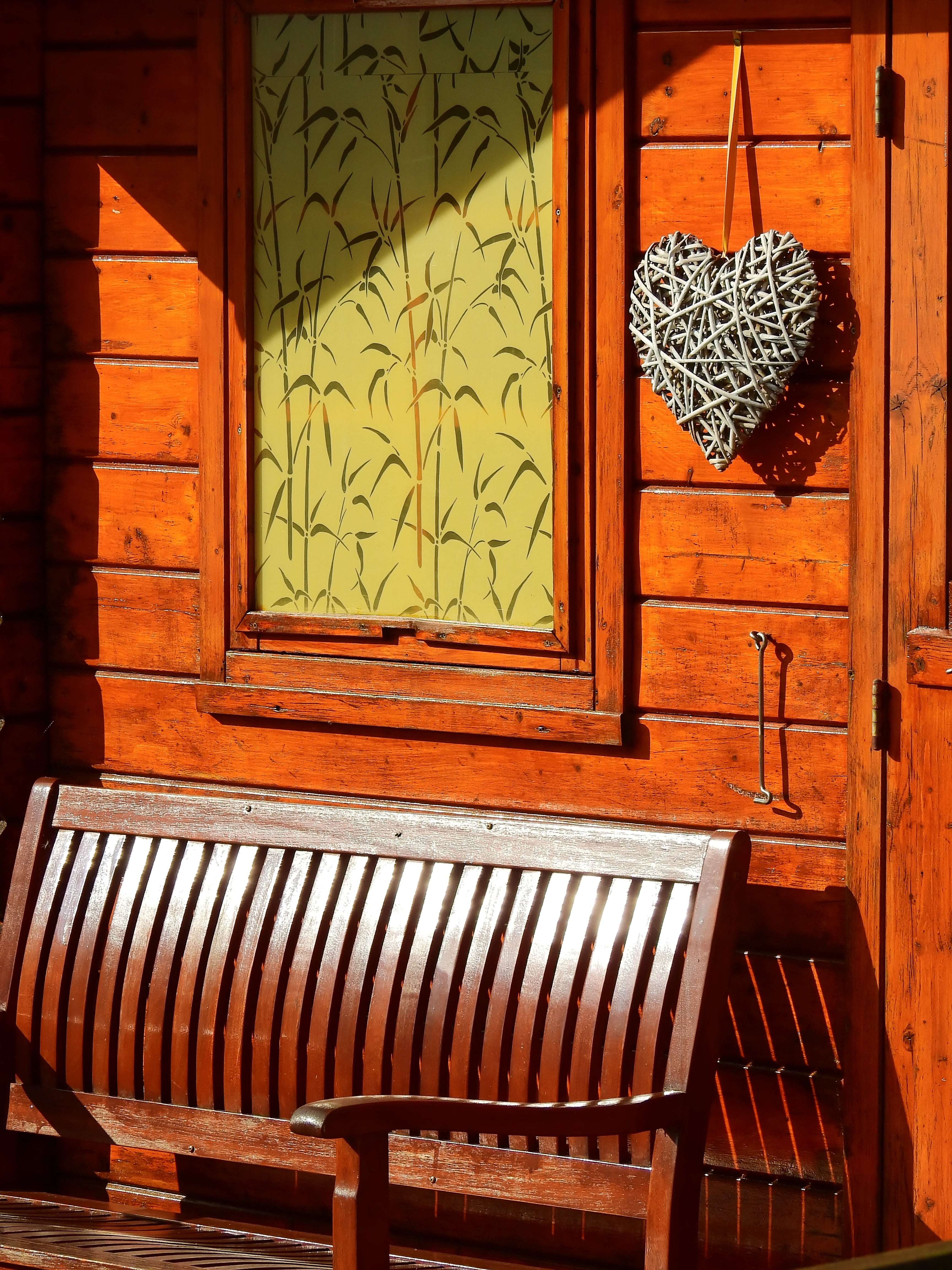 wooden bench, wood, bench, entrance, chair, house, home, love, nature, seat, 4K, door, wall - building feature, floral pattern, bank, absence, home interior, Phone HD Wallpaper