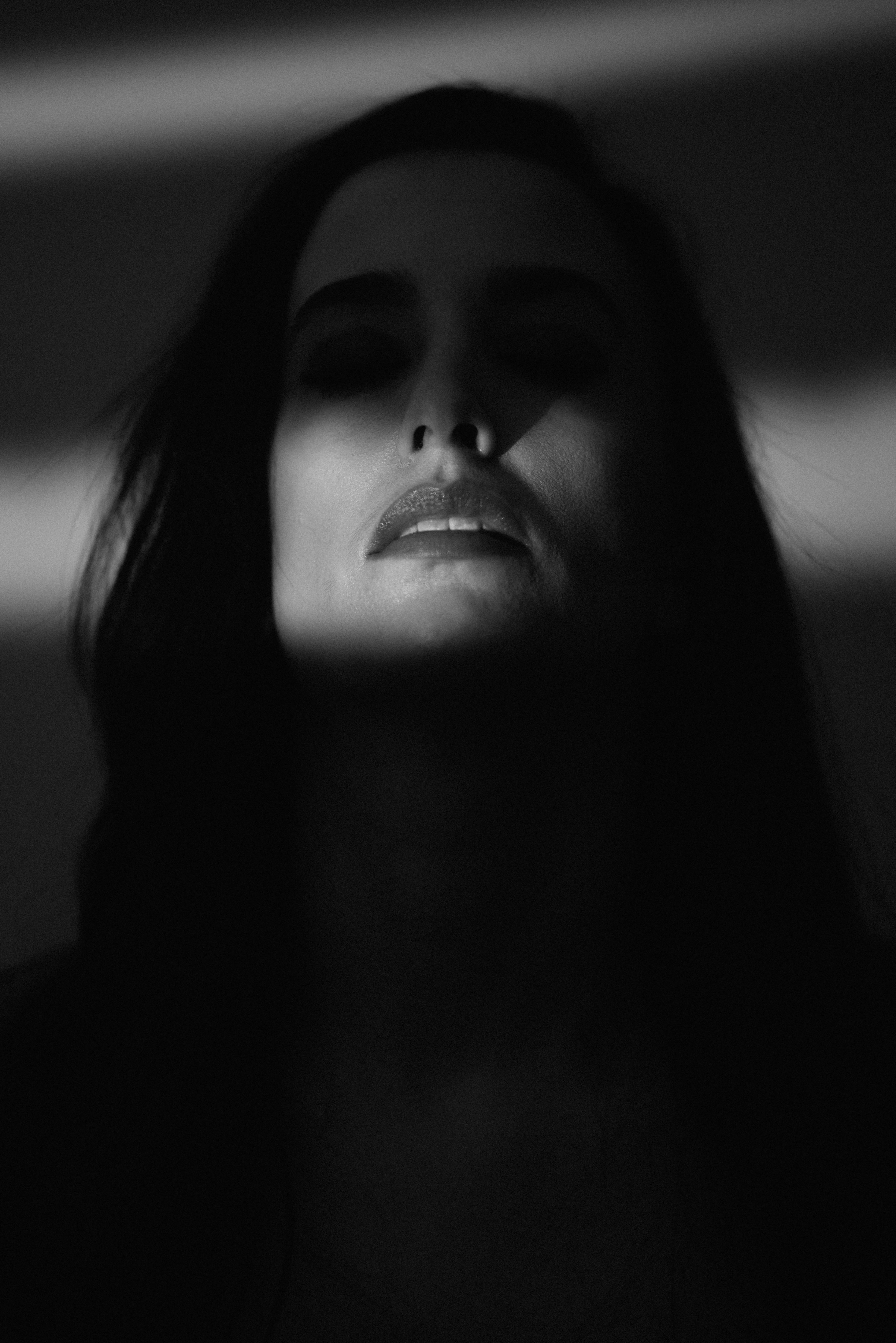 indoors, leisure activity, las vegas, noir, shadow, lifestyles, female, headshot, human face, sunlight, dark, adult, s, front view, human body part, face, Phone HD Wallpaper