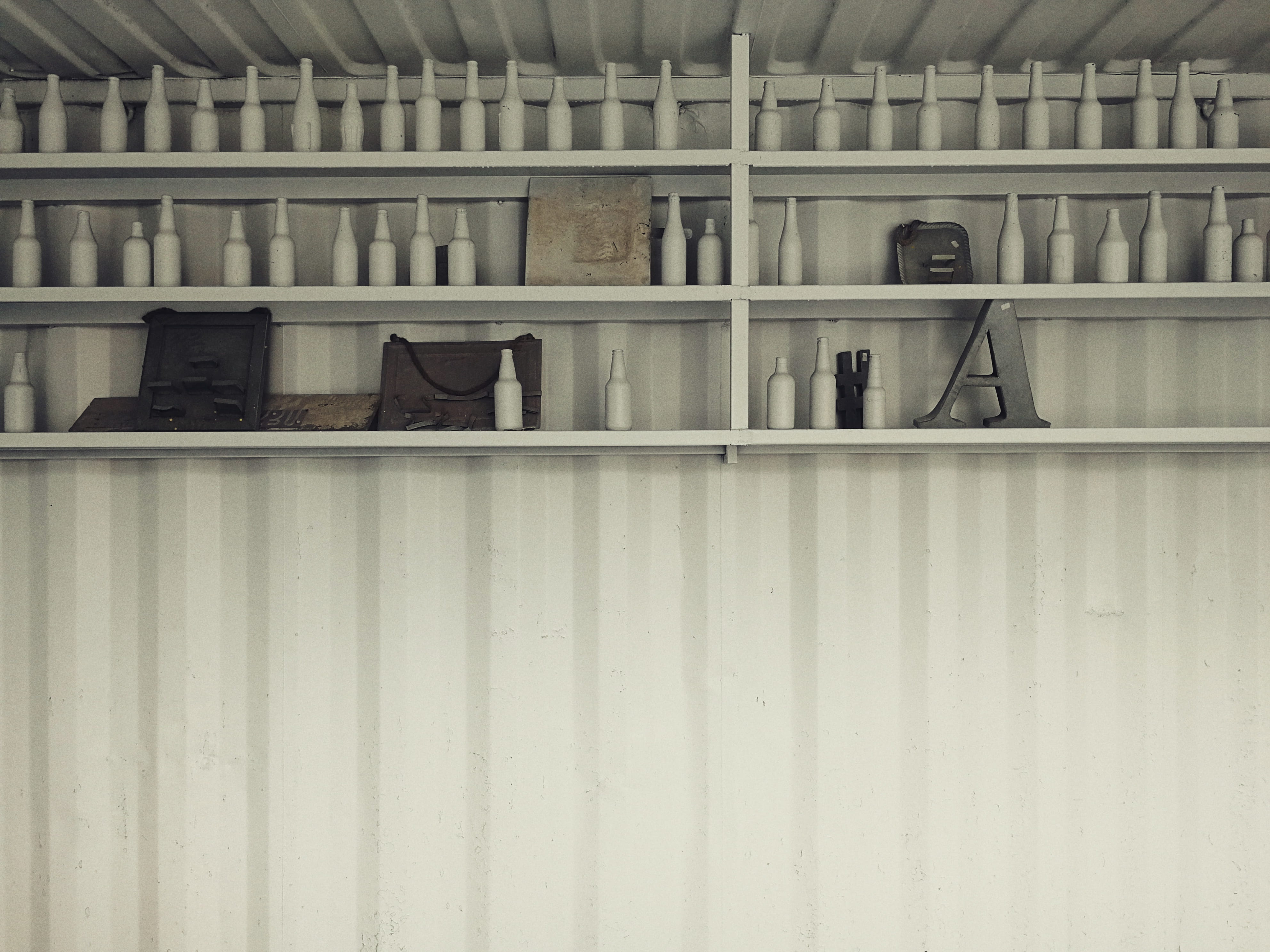 in a row, table, room, cabinet, white, domestic room, indoors, order, architecture, reception, no people, concrete, absence, shelf, closet, container, built structure, HD Wallpaper