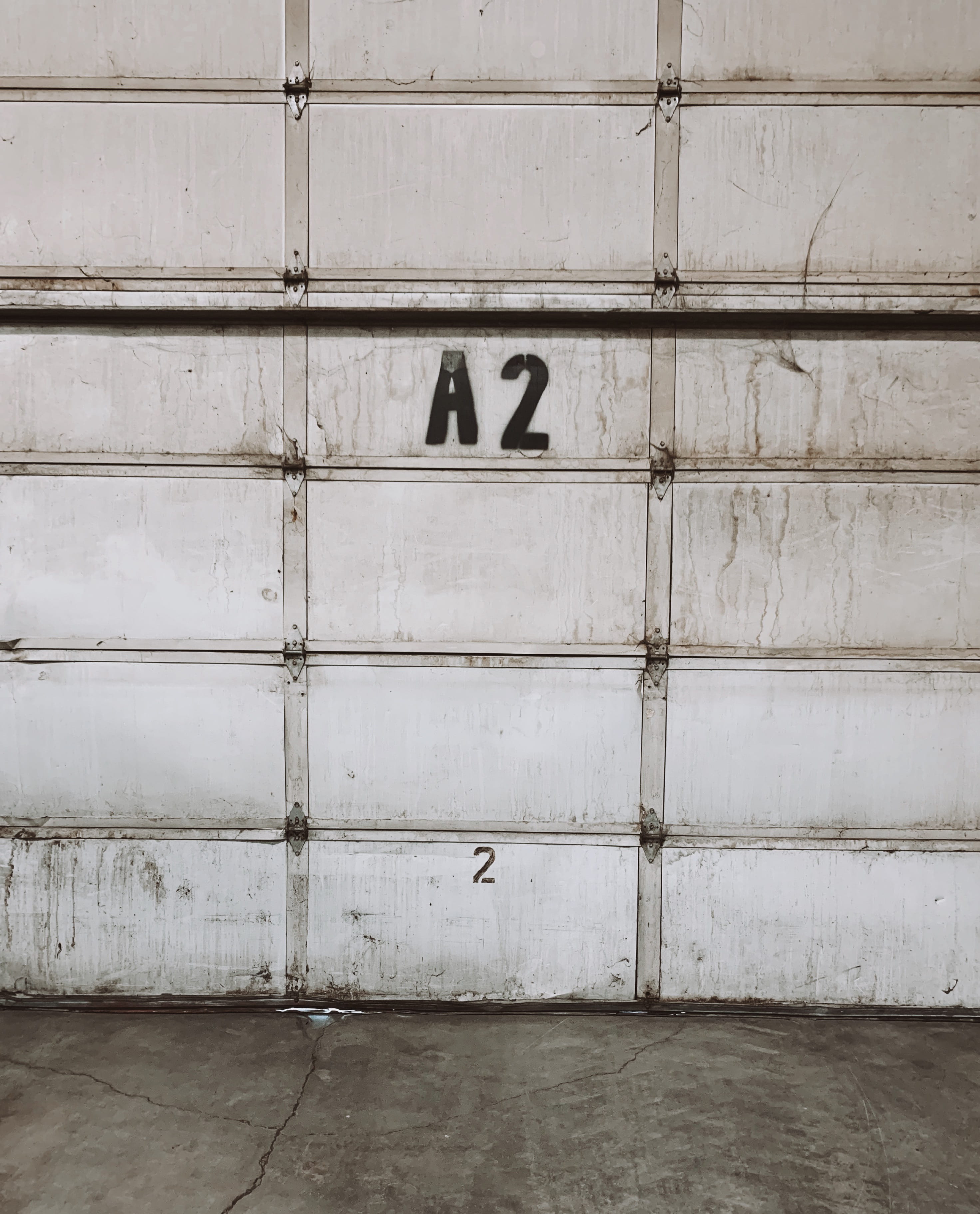 suit, coat, concrete, building exterior, number, text, day, built structure, flooring, door, 2K, apparel, garage, old, wood - material, wall, safety, pattern, Phone HD Wallpaper