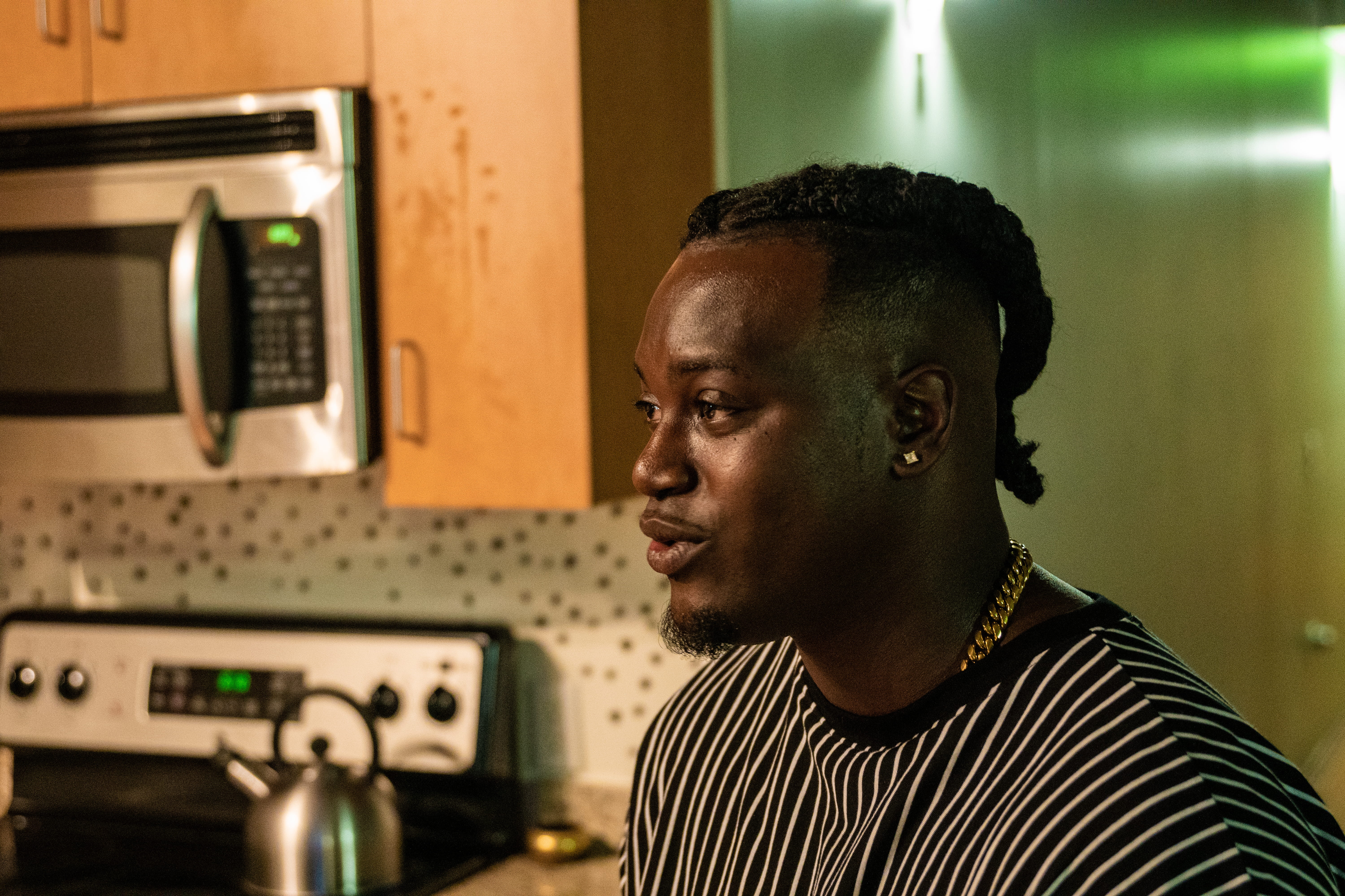 kitchen, afro hairstyle, appliance, microwave, focus on foreground, furniture, striped, closet, home interior, black, person, white, connection, close-up, HD Wallpaper