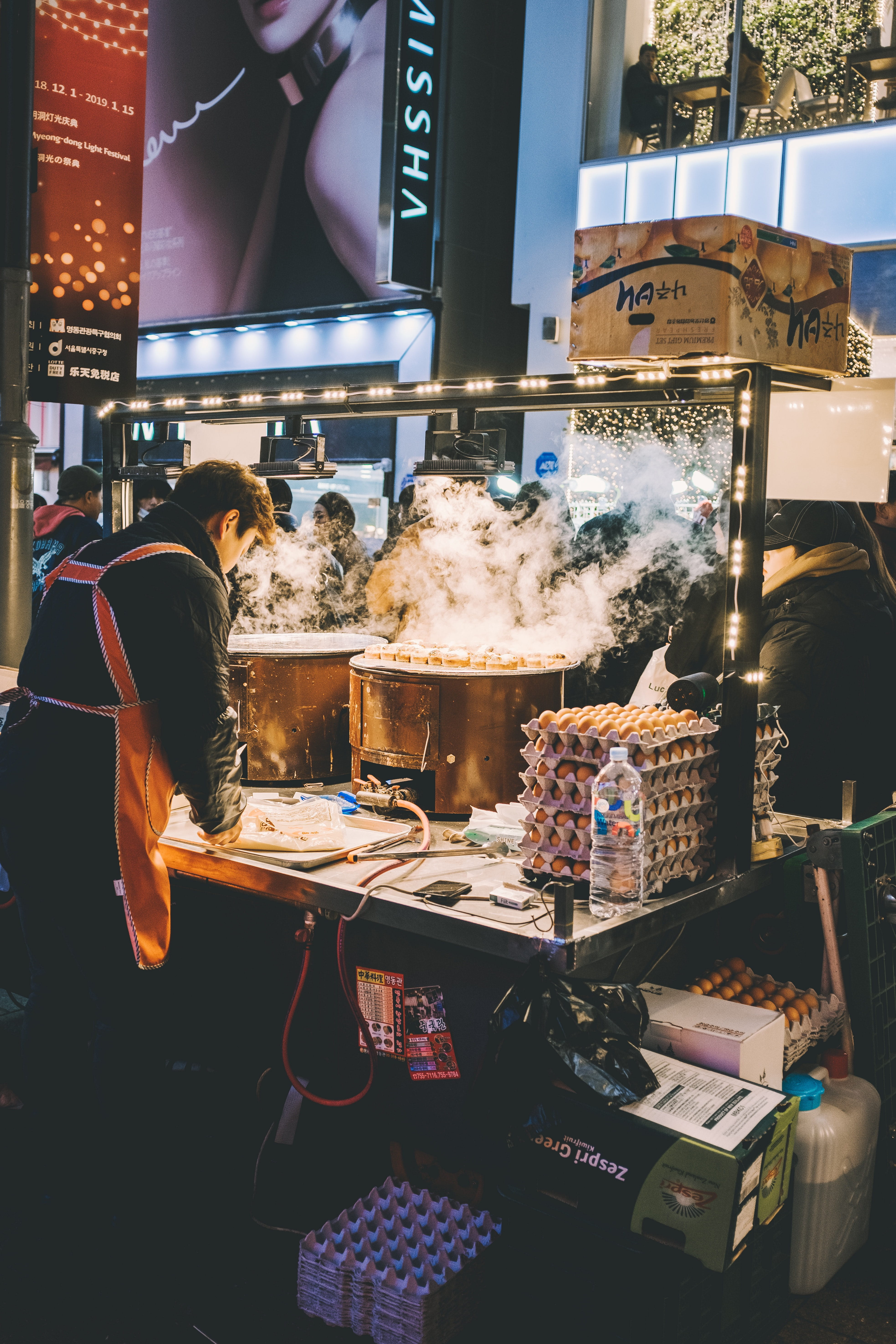 text, hair, market stall, person, apparel, communication, clothing, machine, business, for sale, shelf, myeong-dong, women, illuminated, human, people, Phone HD Wallpaper