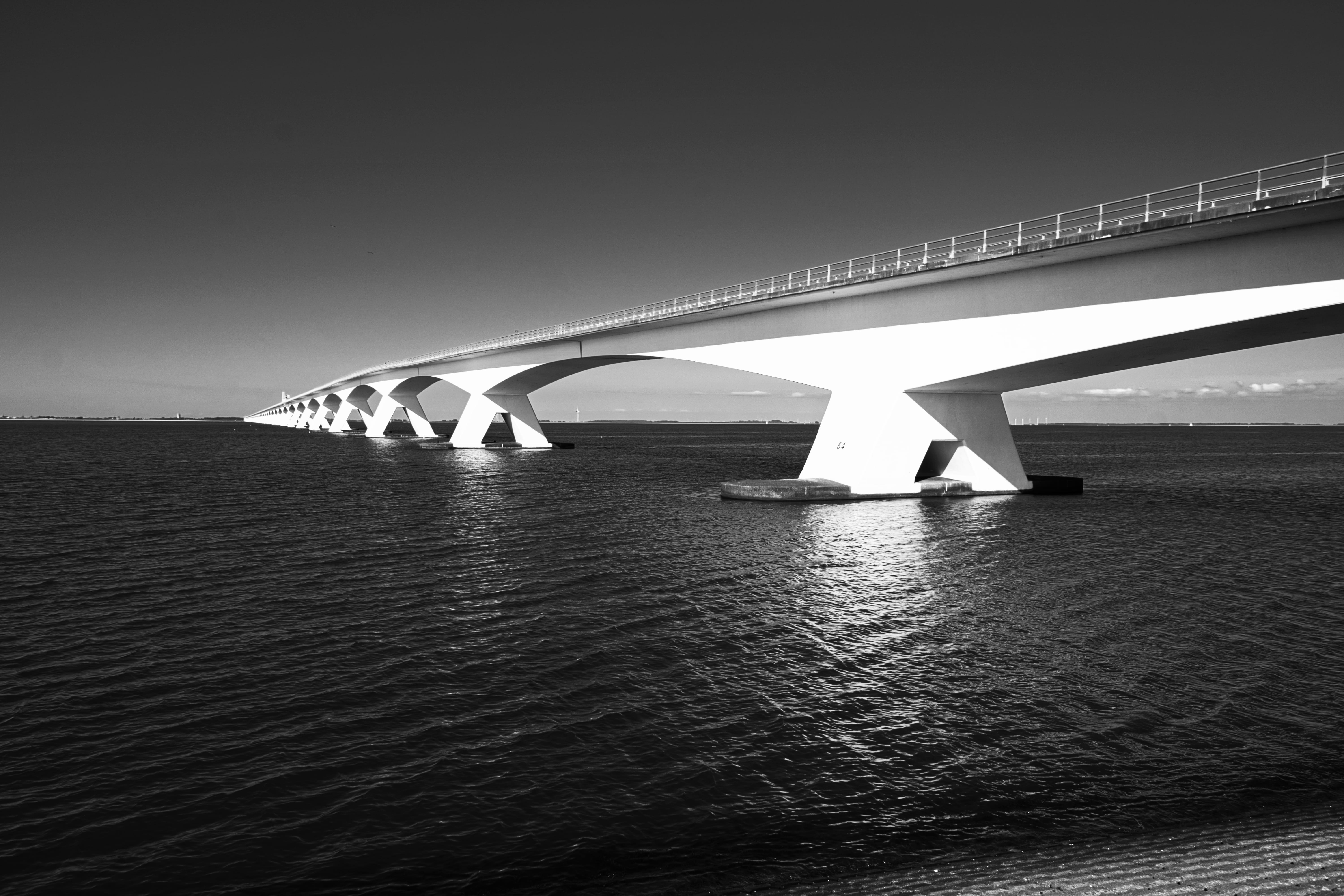 sky, nature, waterfront, architecture, zeeland, 5K, long, water, clear sky, sea, bridge - man made structure, no people, arch bridge, travel, low angle view, HD Wallpaper