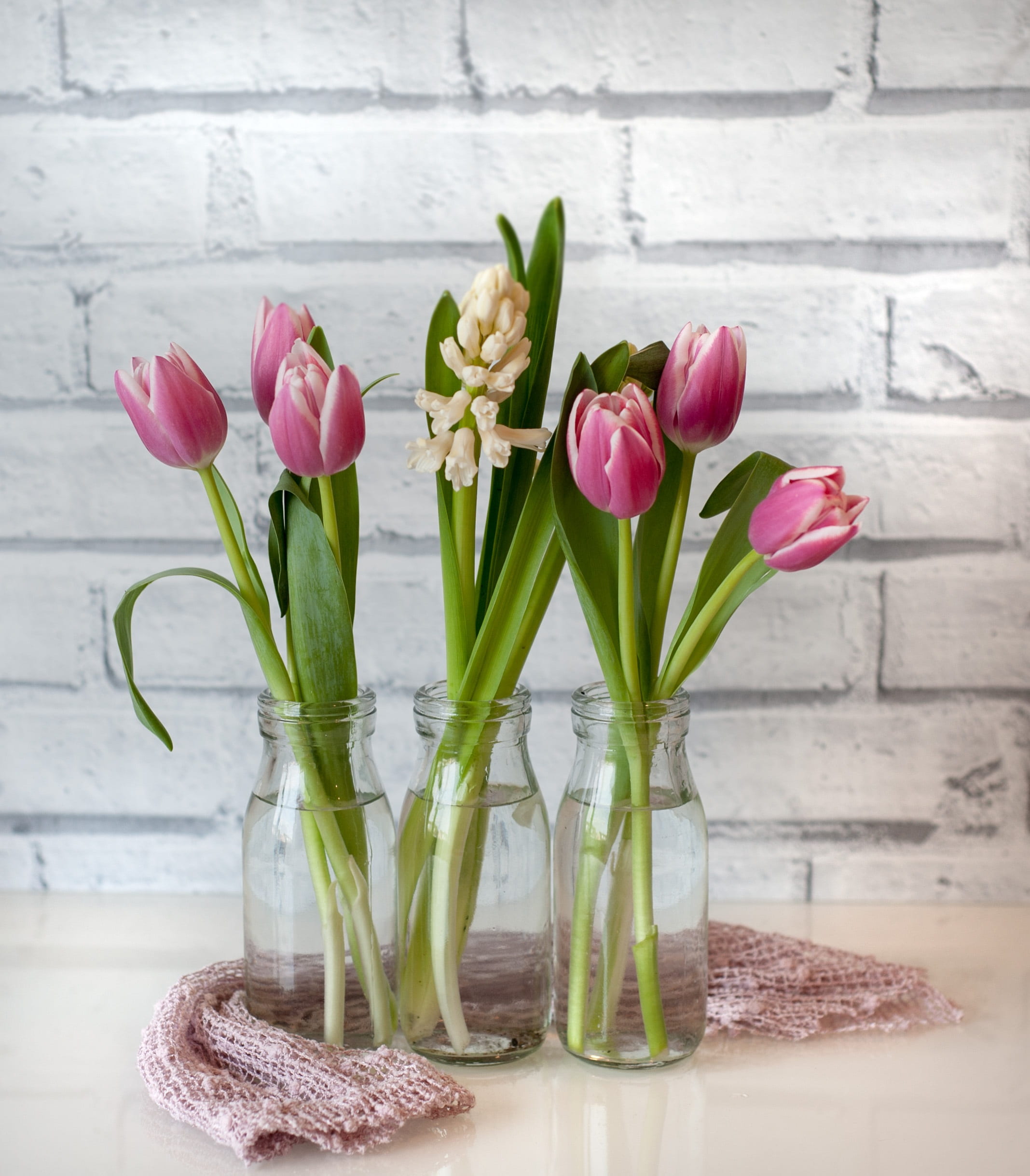 glass, fabric, tulips, red, wooden, wood, vulnerability, close-up, flower, flower arrangement, beige, still life, beauty in nature, nature, purple, egg, Phone HD Wallpaper
