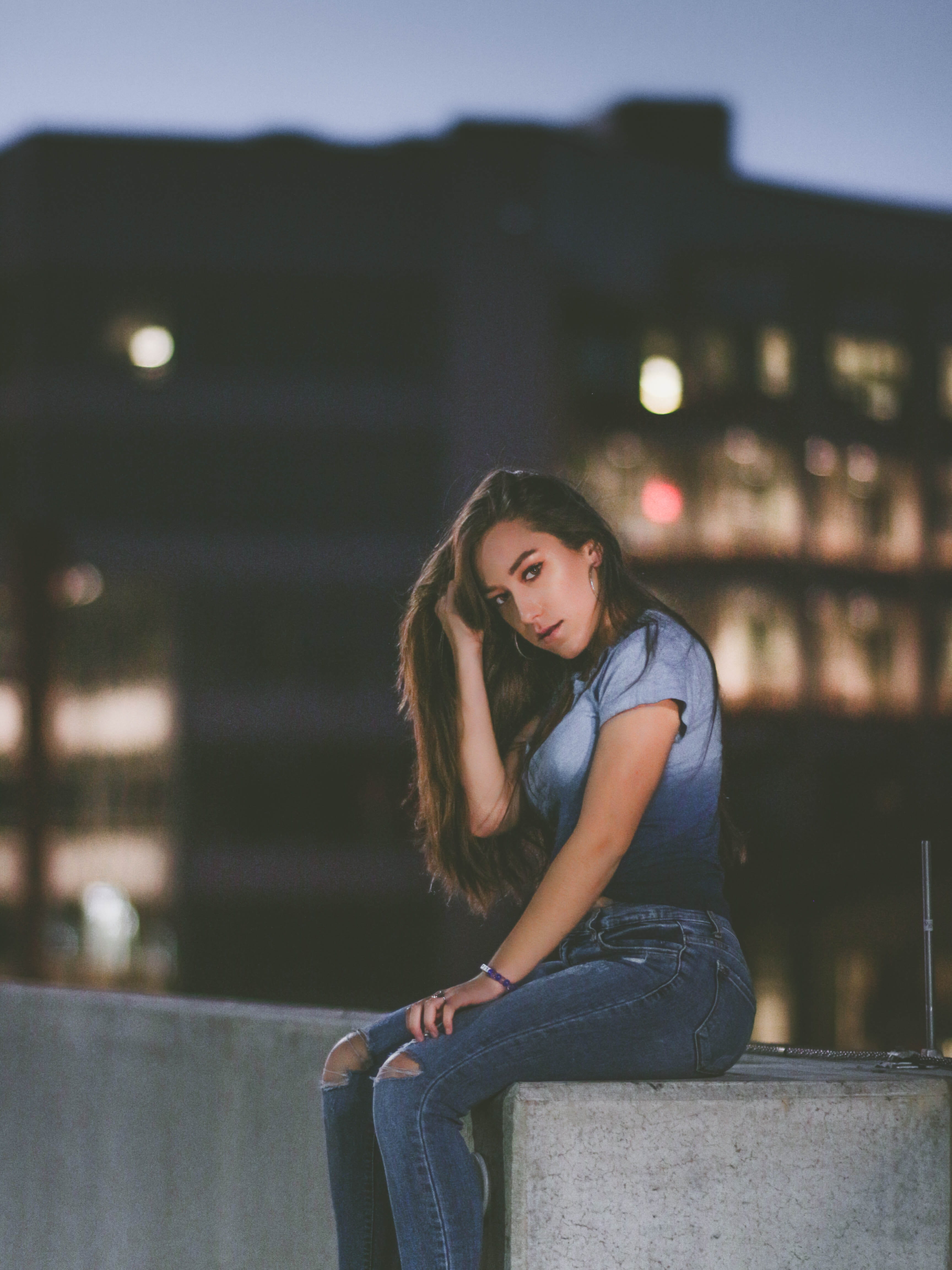 focus on foreground, building, leisure activity, beautiful, blue, casual clothing, contemplation, night, warm, architecture, concrete, time, hairstyle, Phone HD Wallpaper