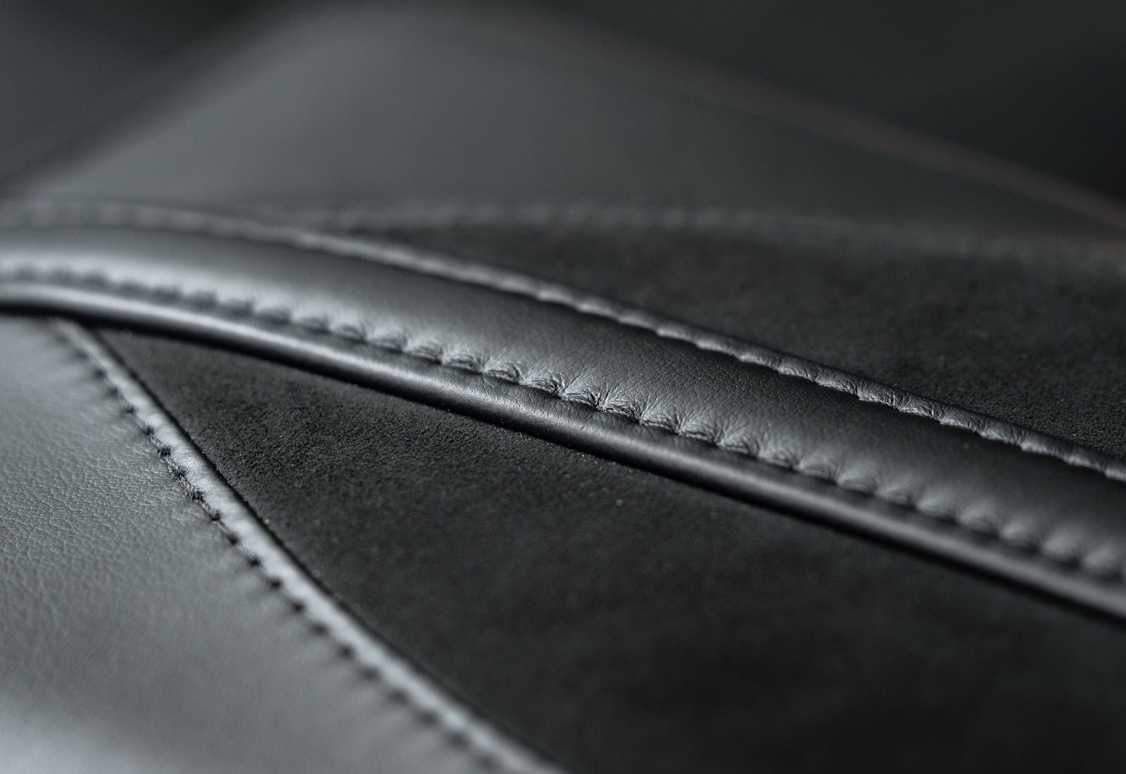 black background, high angle view, close-up, leather, grey, zipper, simplicity, aston, indoors, photography themes, arts culture and entertainment, no people, HD Wallpaper