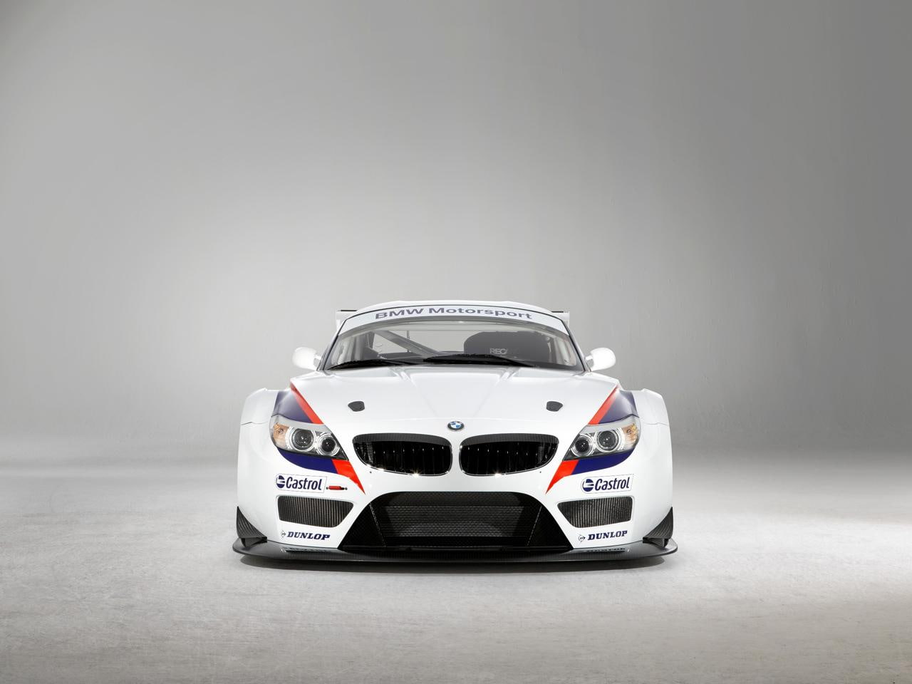 sports car, z, 720P, copy space, people, mode of transportation, sports helmet, success, indoors, racecar, transportation, car, gray, gt, front view, gray background, HD Wallpaper