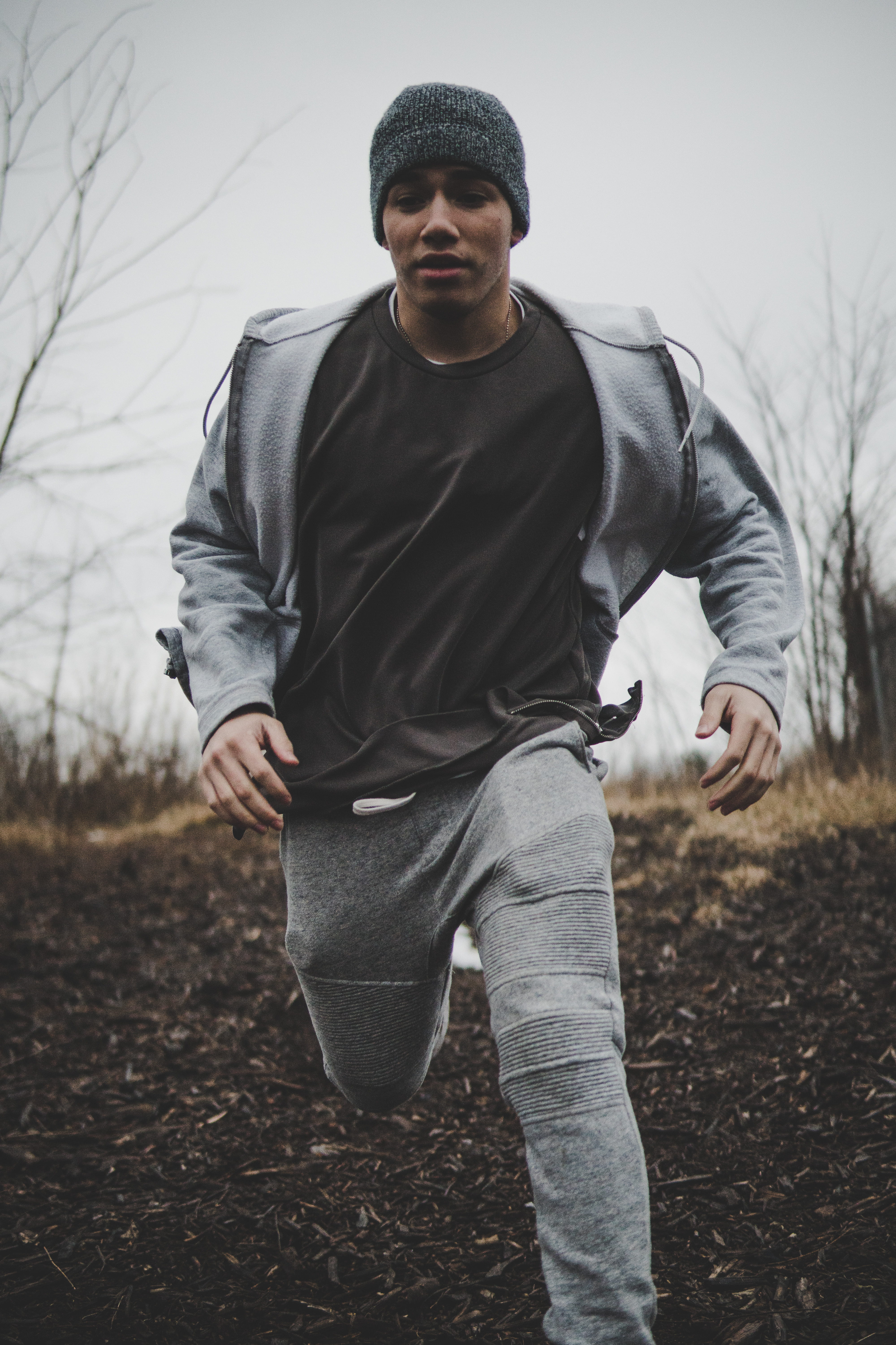 trees, casual clothing, sweater, black, scruff, cloudy, sprinting, bare, tree, jacket, looking away, hoodie, portrait, 5K, soil, hat, one person, fall, Phone HD Wallpaper