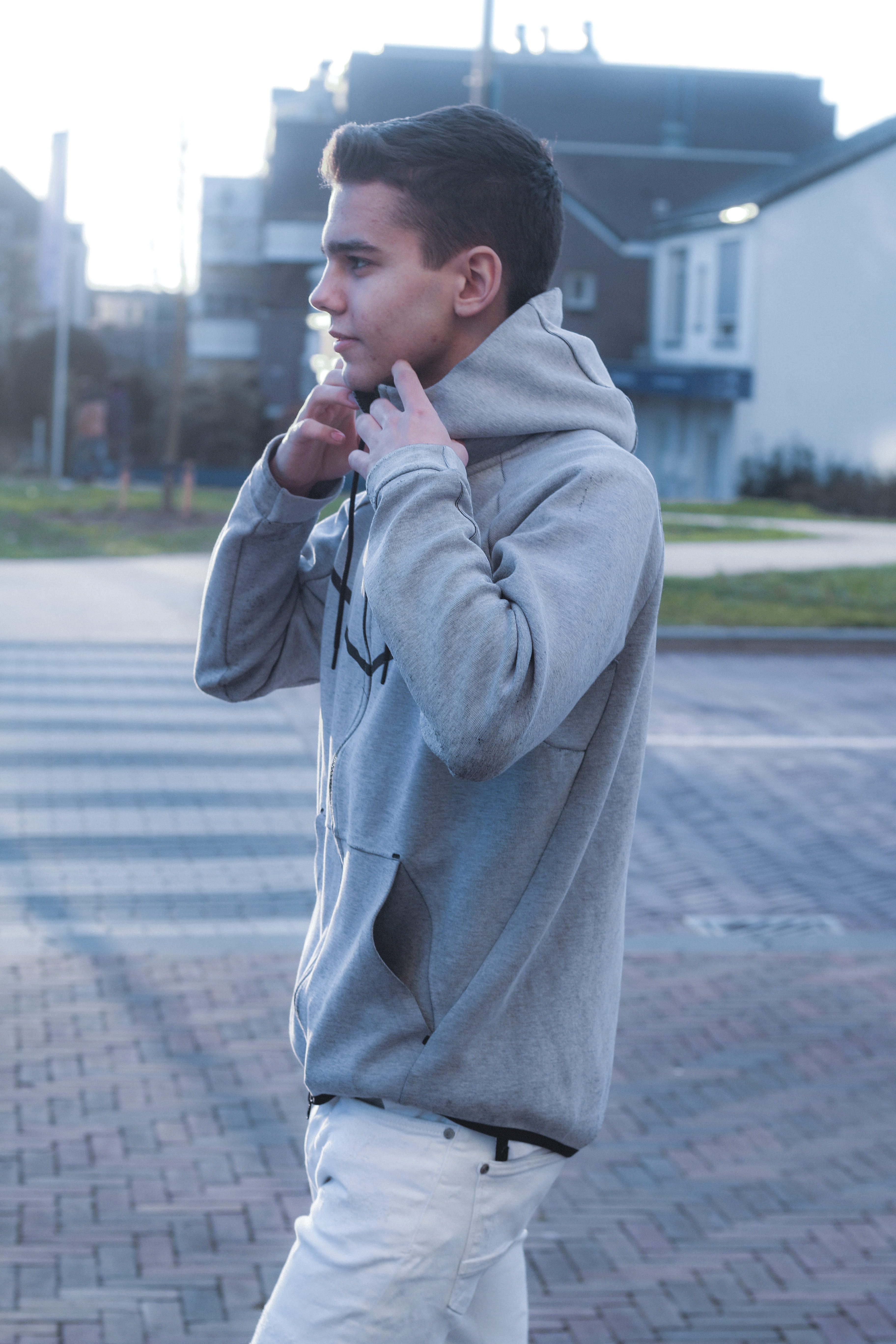 one person, lifestyles, asphalt, outdoors, long sleeve, 5K, road, young adult, city, leisure activity, looking away, tarmac, sweater, apparel, walkway, Phone HD Wallpaper