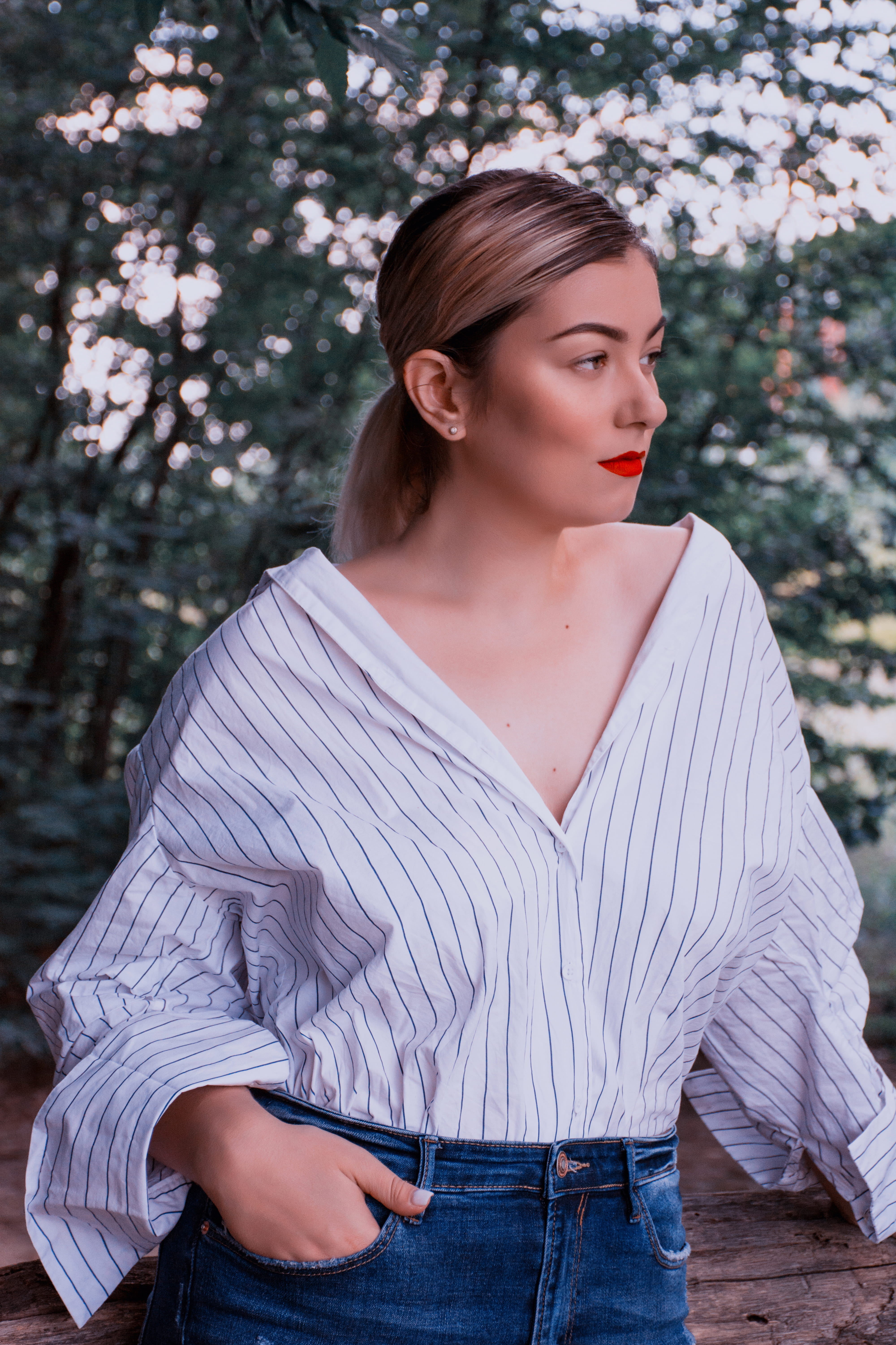 ponytail, outdoors, lady, contemplation, trees, young women, blouse, people, day, lifestyles, female, beauty, three quarter length, one person, clothing, Phone HD Wallpaper