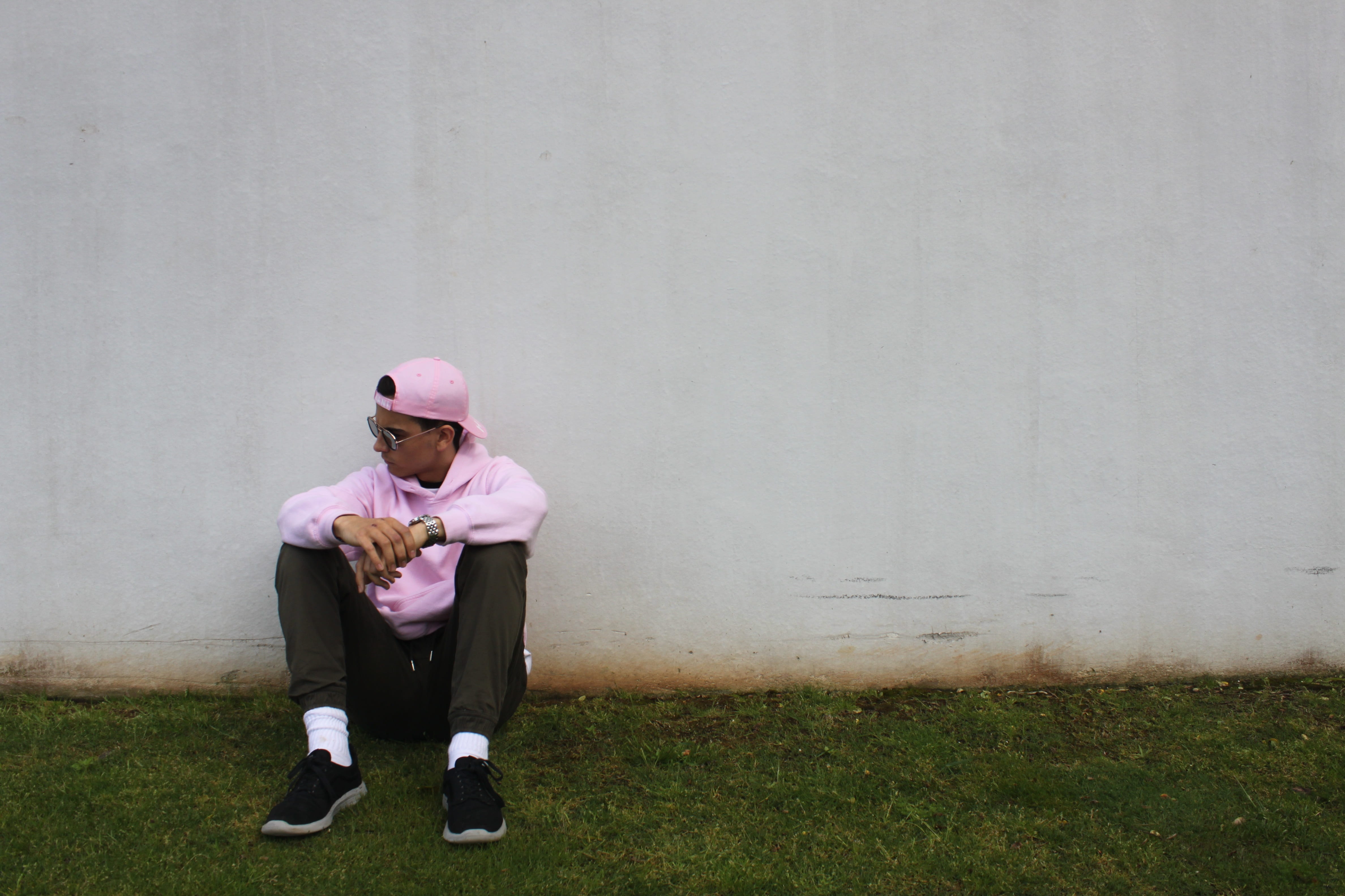 Skater, men, clothing, young adult, grass, relaxation, sadness, leisure activity, full length, lifestyles, Pink, wall - building feature, sitting, guy, HD Wallpaper