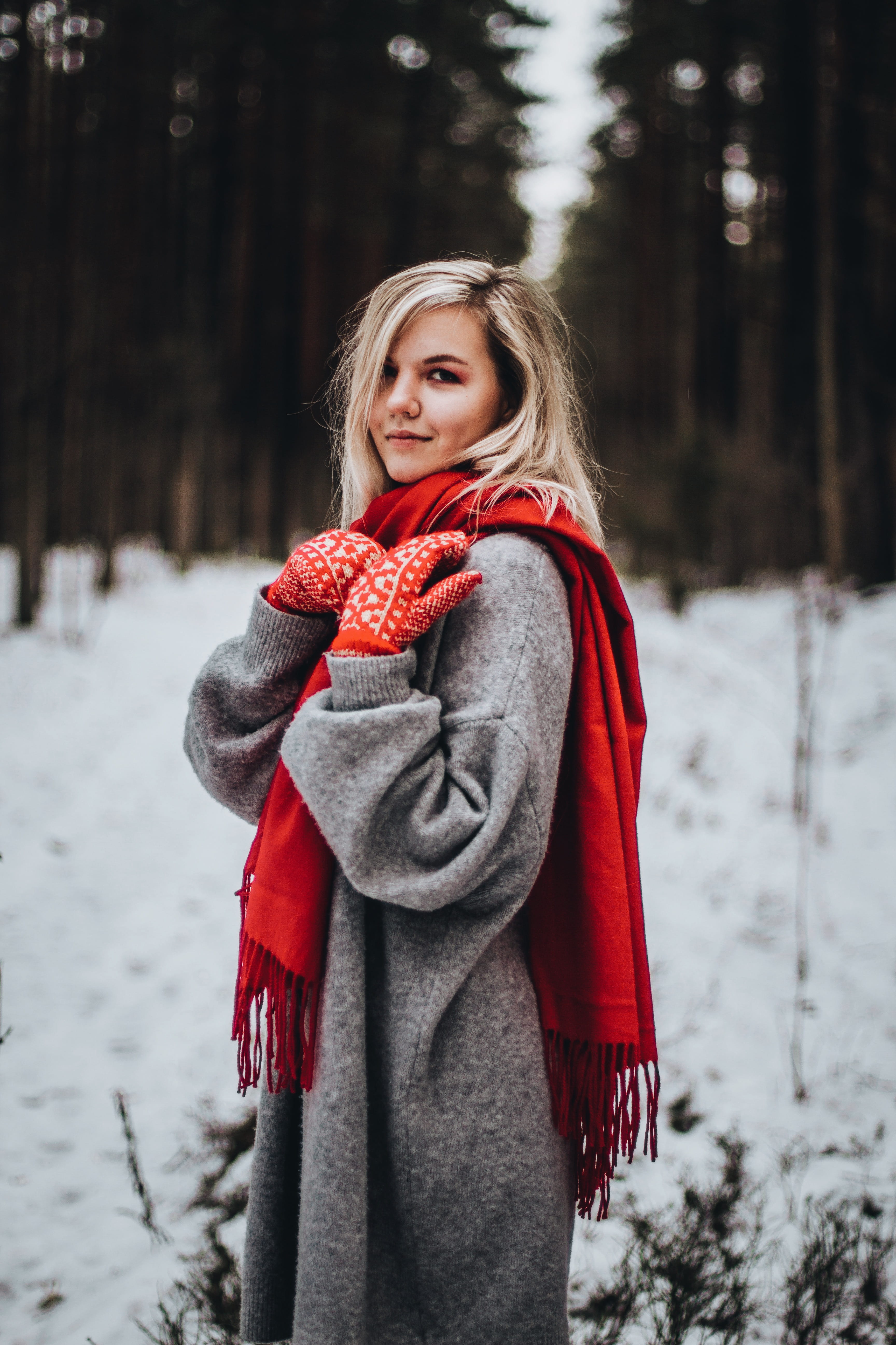 hoodie, hood, focus on foreground, pants, one person, sleeve, tree, long sleeve, portrait, standing, sweater, scarf, outdoors, gray, human, young adult, Phone HD Wallpaper