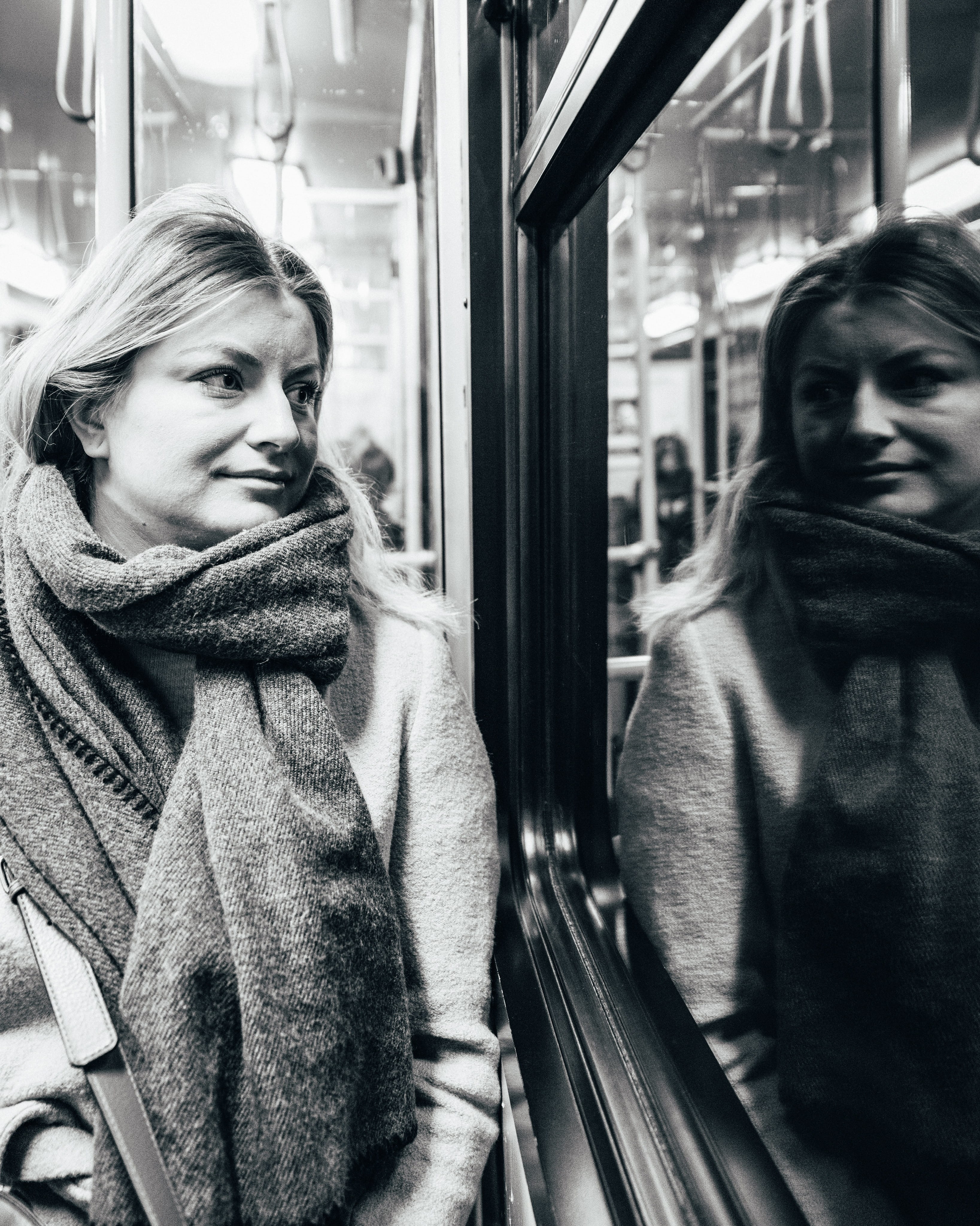 clothing, train, pedestrian, reflection, human, vehicle interior, public transportation, coat, travel, beautiful woman, transportation, black, mirror, subway train, Phone HD Wallpaper
