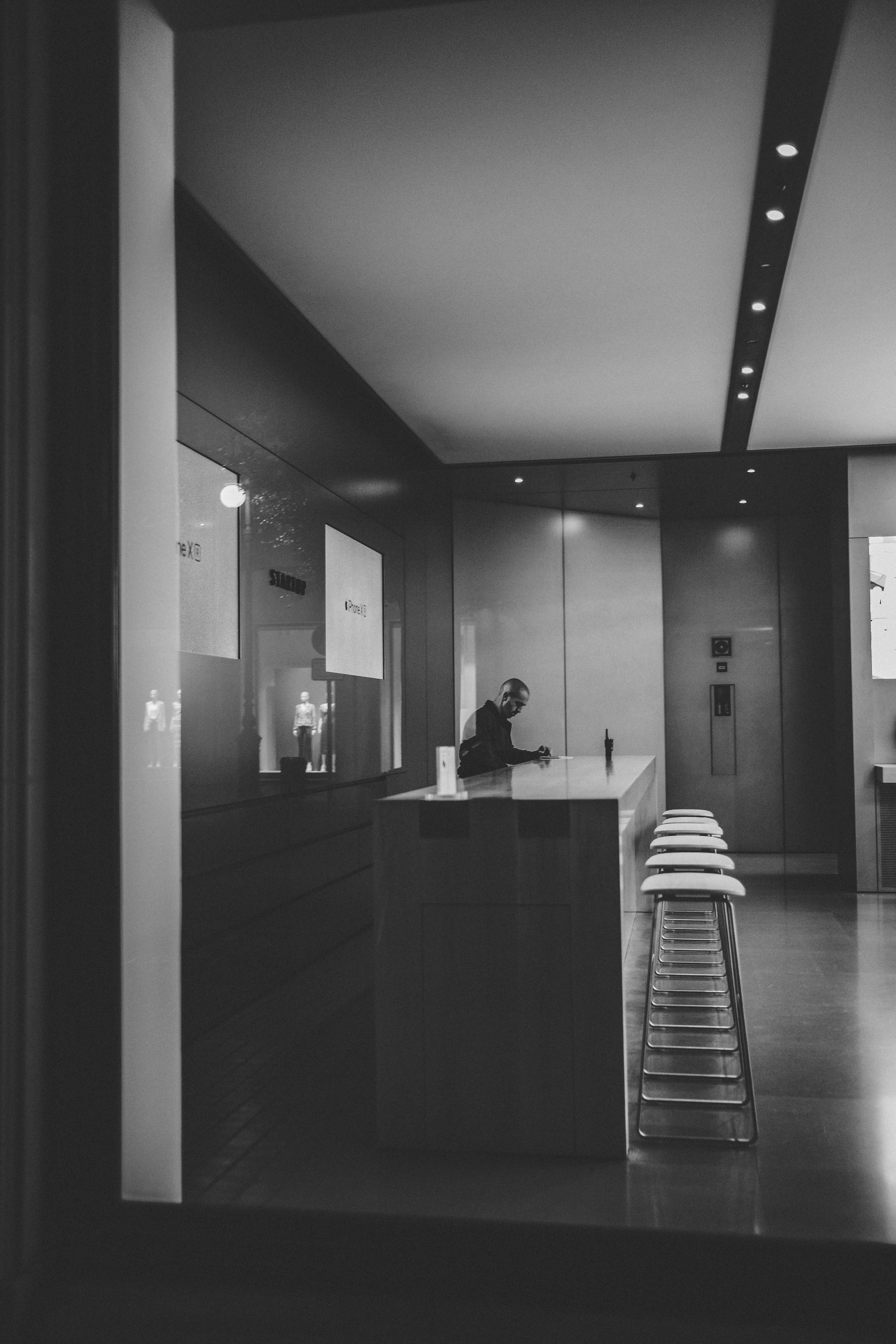 one person, business, beside, seat, floor, illuminated, photography, reflection, real people, door, window, architecture, office, hardwood, lighting, meal, Phone HD Wallpaper