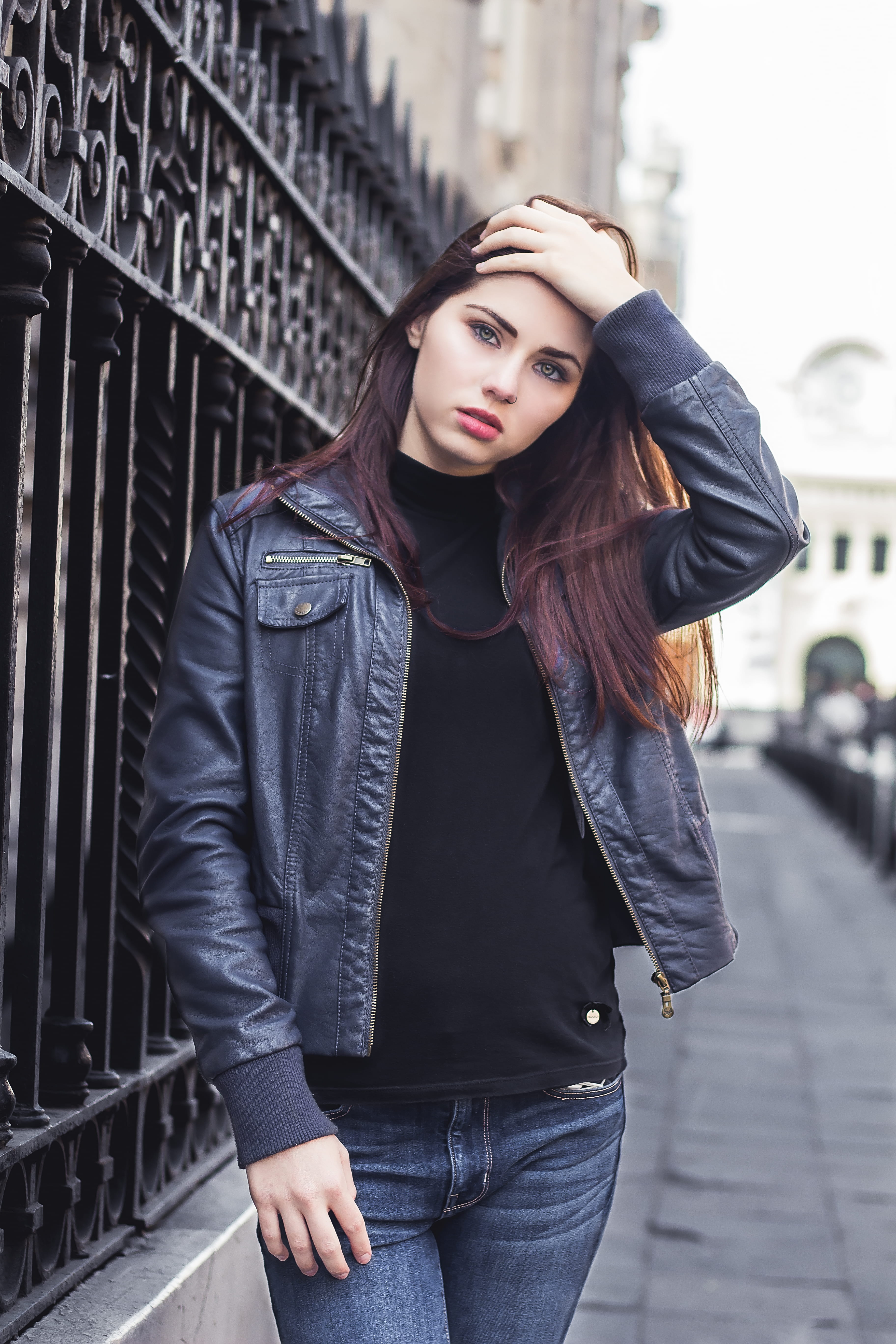 street portrait, real people, explorer, one person, beautiful woman, leather jacket, contemplation, long hair, gate, young adult, young woman, street photography, Phone HD Wallpaper