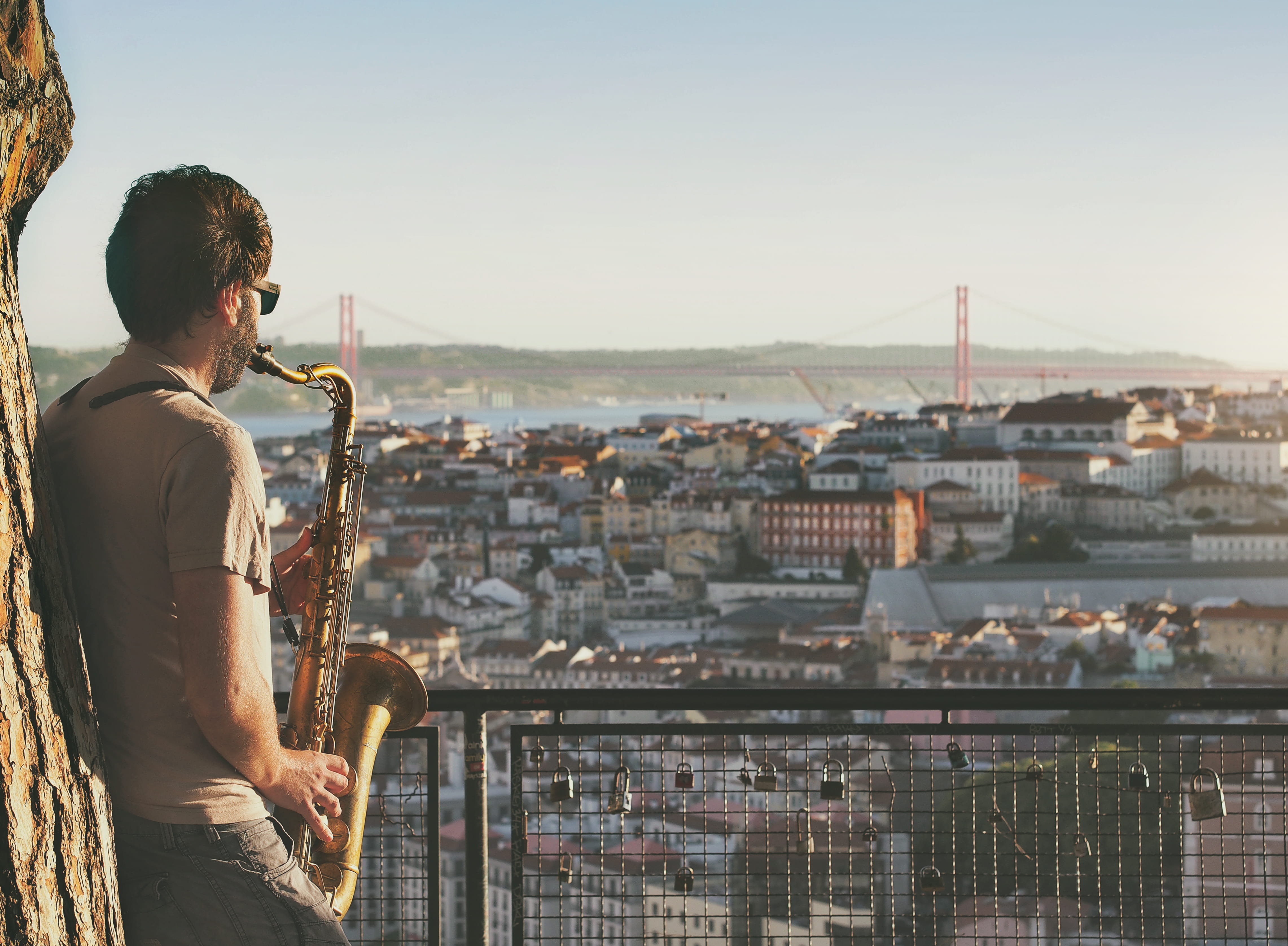 sunset, day, river, bridge, lisbo, music band, city, drinking, looking at view, leisure activities, real people, horn, daytime, standing, leisure activity, HD Wallpaper