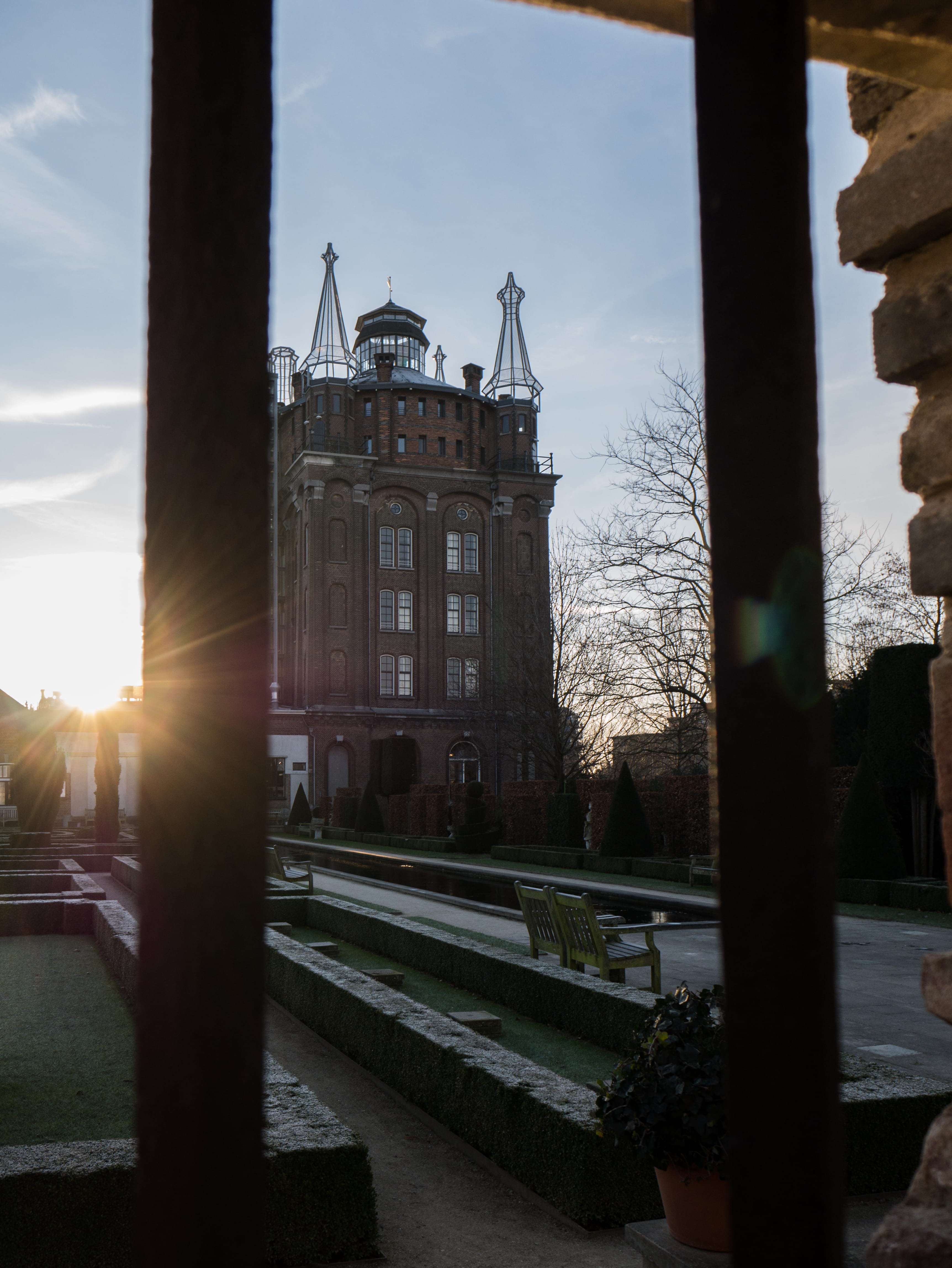 bars, no people, sky, outdoors, hotel, dordrecht, netherlands, history, tree, nature, building exterior, city, lens flare, day, sunbeam, architectural column, Phone HD Wallpaper