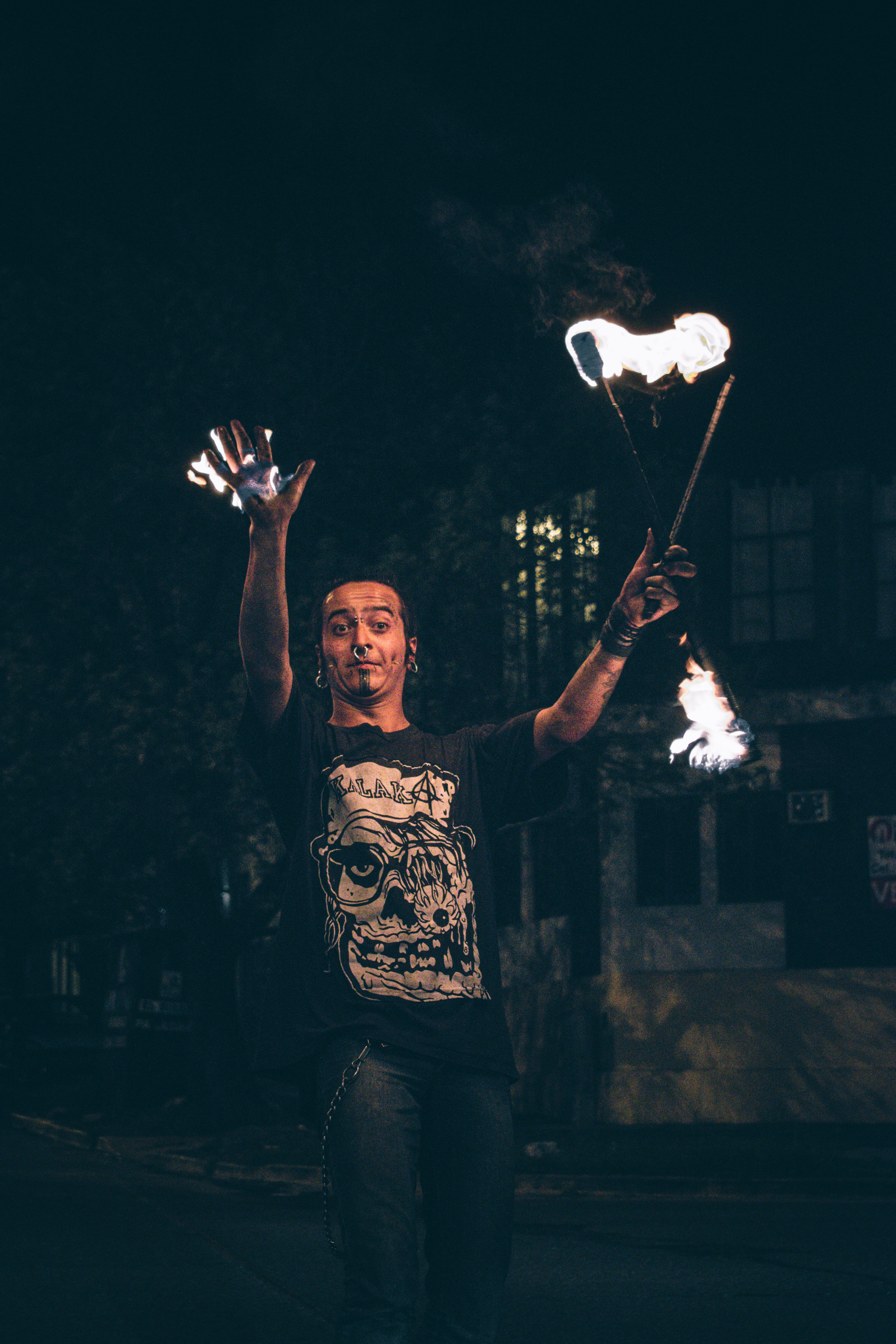 arms raised, lifestyles, argentina, front view, fire, leisure activity, calle, urban, human arm, juggle, women, casual clothing, three quarter length, night, Phone HD Wallpaper
