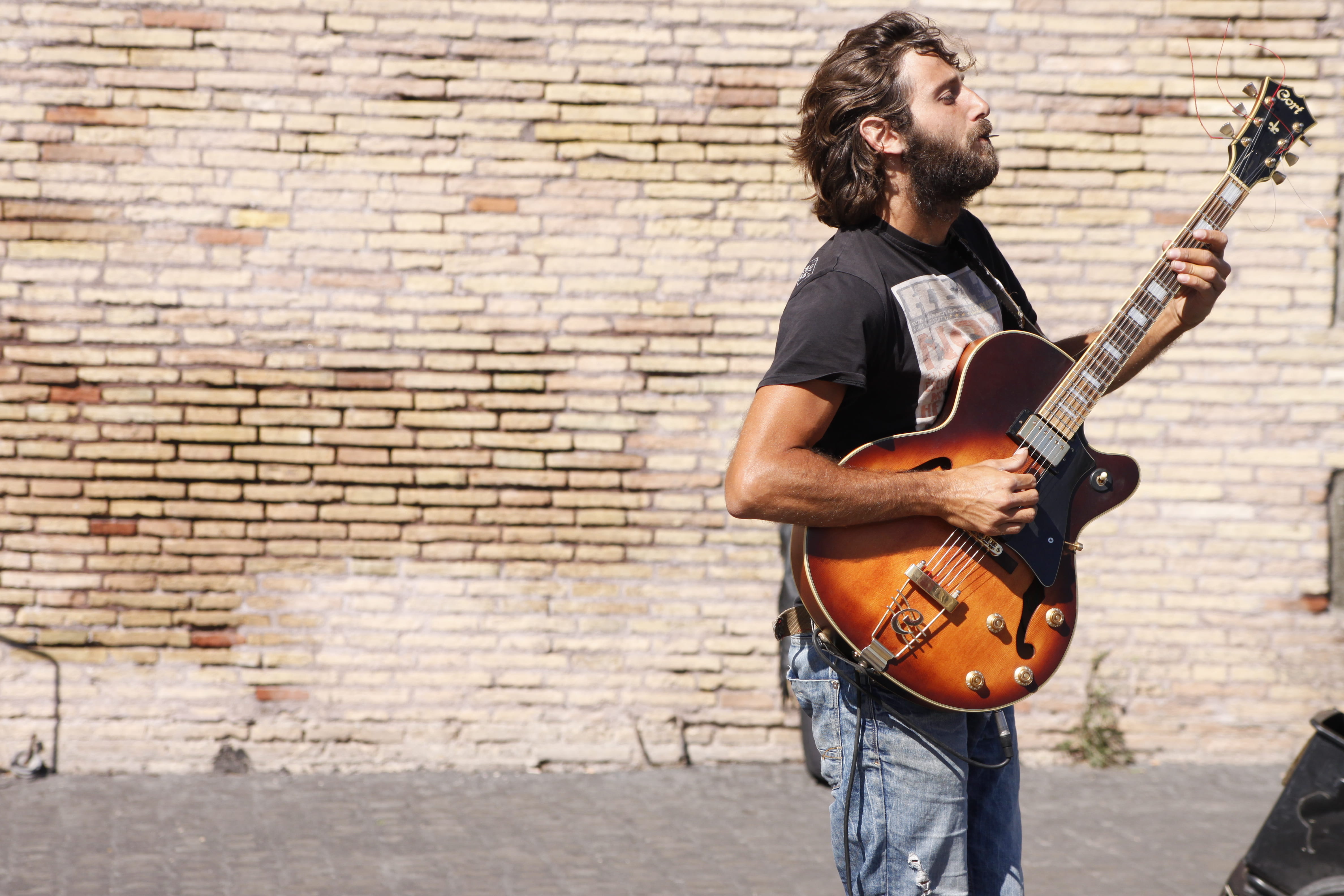 play, one person, rock music, plucking an instrument, human, handsom, jeans, musician, performer, guitar, music, 4K, artist, brick, playing, wall, people, HD Wallpaper