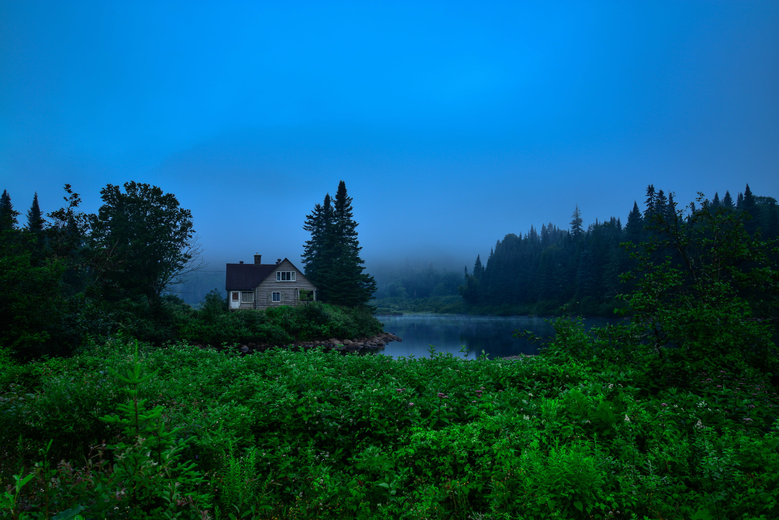 fog, mountain Range, lake, environment, building, sunlight, non-Urban Scene, building exterior, river, built structure, tree, greens, reflection, black, HD Wallpaper