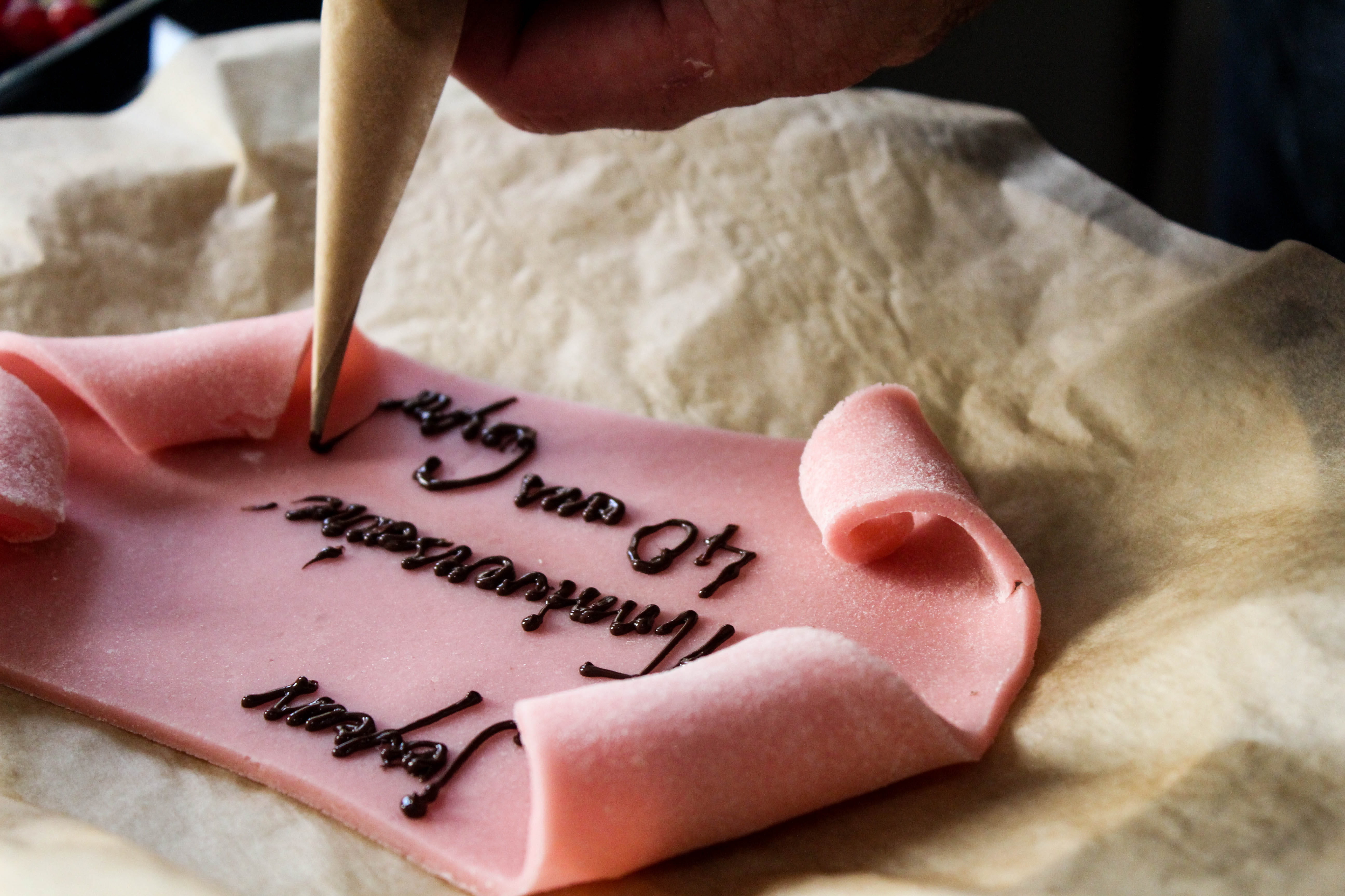 human body part, paper, pastry shop, indoors, close-up, ink, script, hand, message, non-western script, cakes, bday, western script, one person, human hand, HD Wallpaper