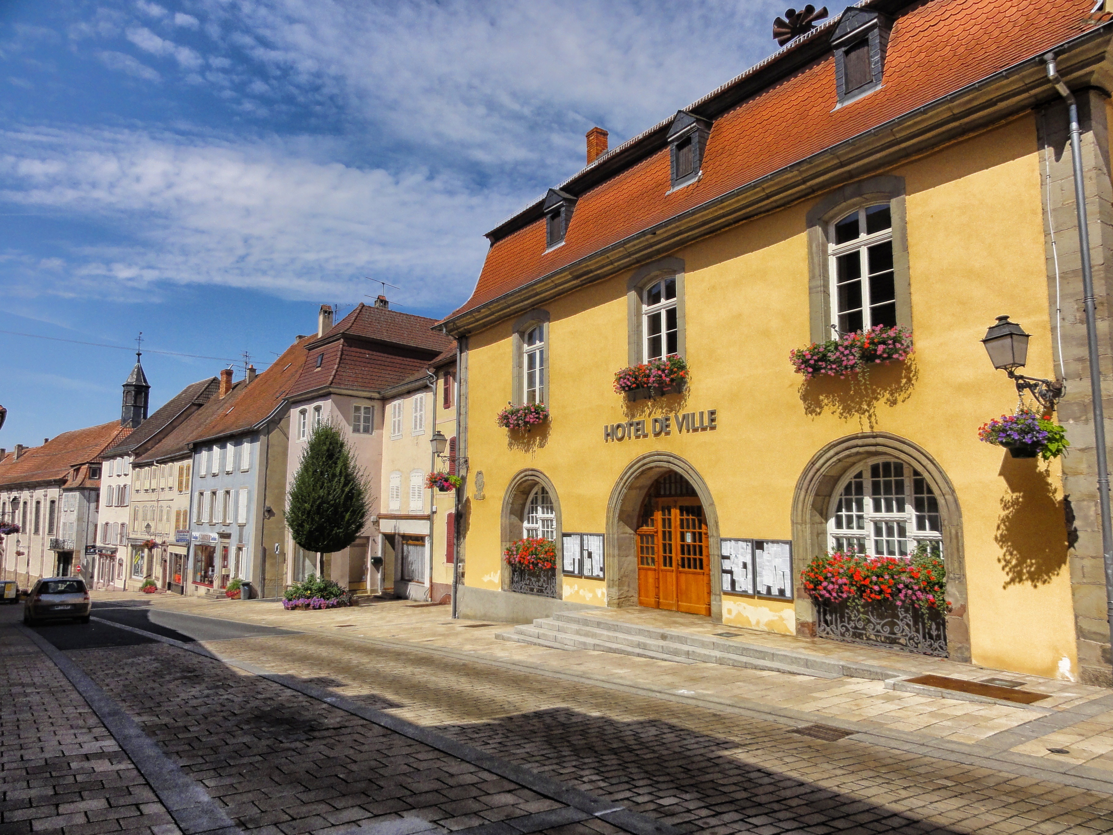 flowers, france, buildings, residential district, window, clouds, no people, transportation, nature, cobblestone, skyline, outside, village, entrance, street, HD Wallpaper