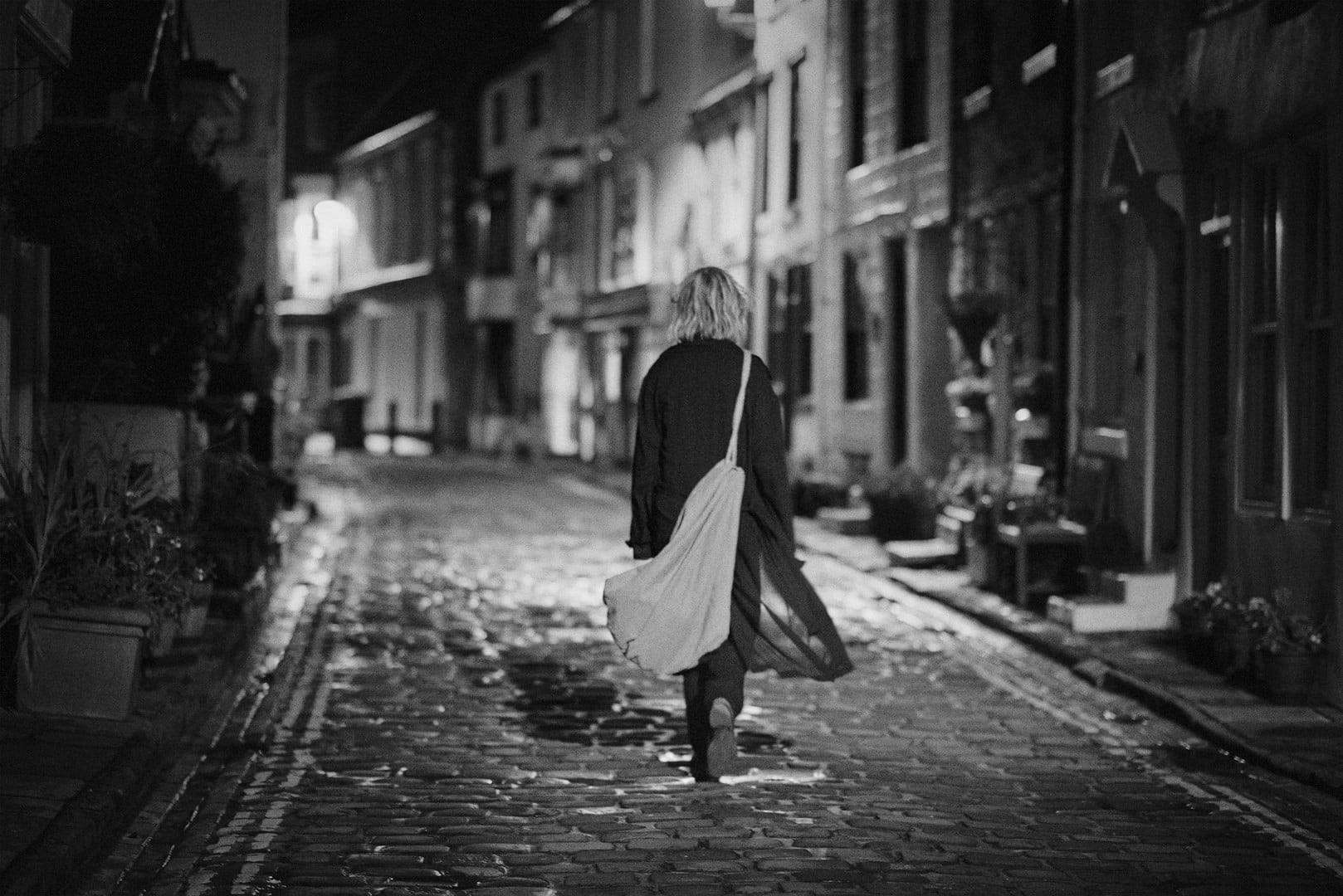adult, city, footpath, building, built structure, fashion, direction, hairstyle, real people, standing, one person, walking, building exterior, Lou Schoof, HD Wallpaper