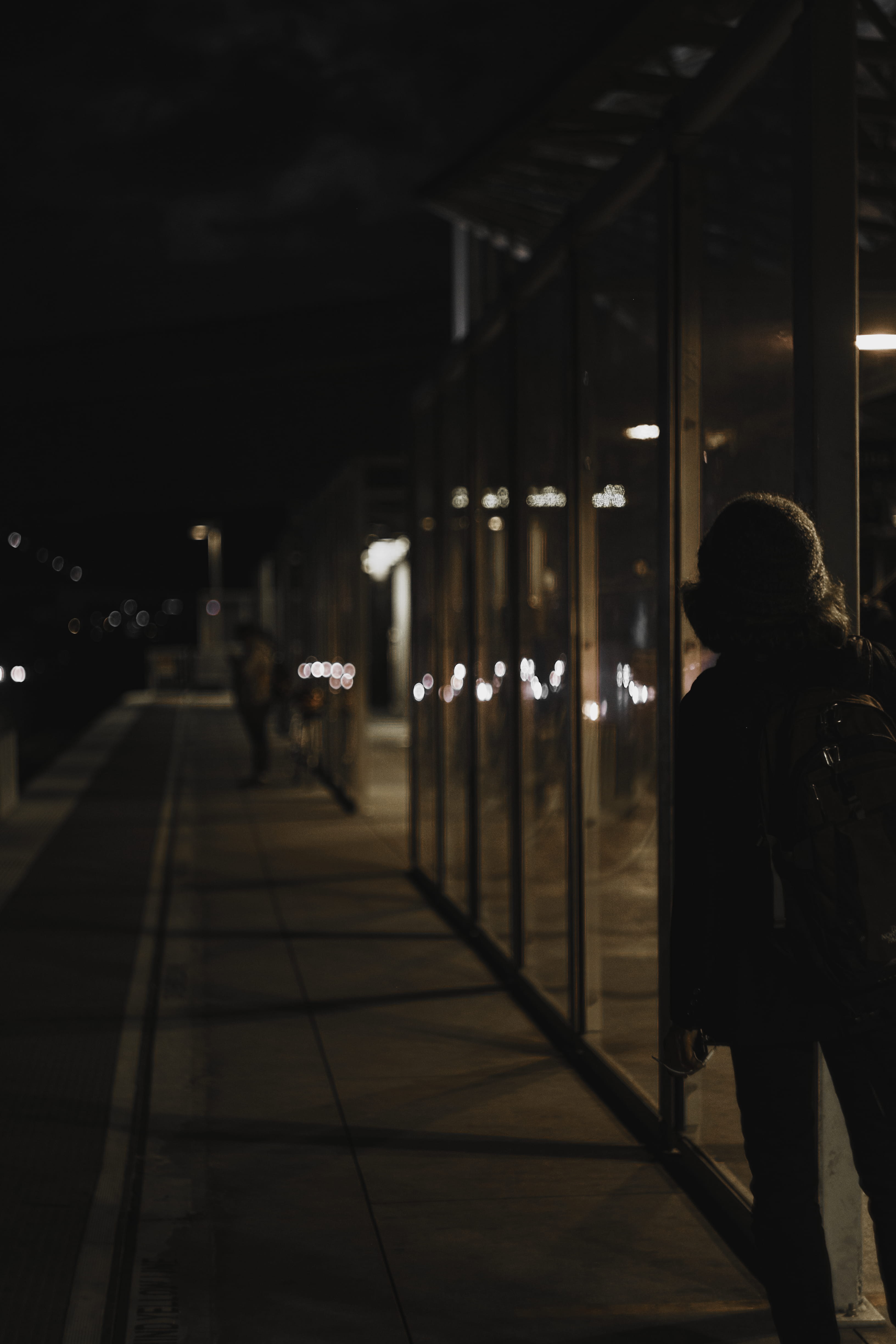 warm clothing, architecture, apparel, person, street, train, metro, banister, night, one person, real people, pavement, lifestyles, pedestrian, low light, Phone HD Wallpaper