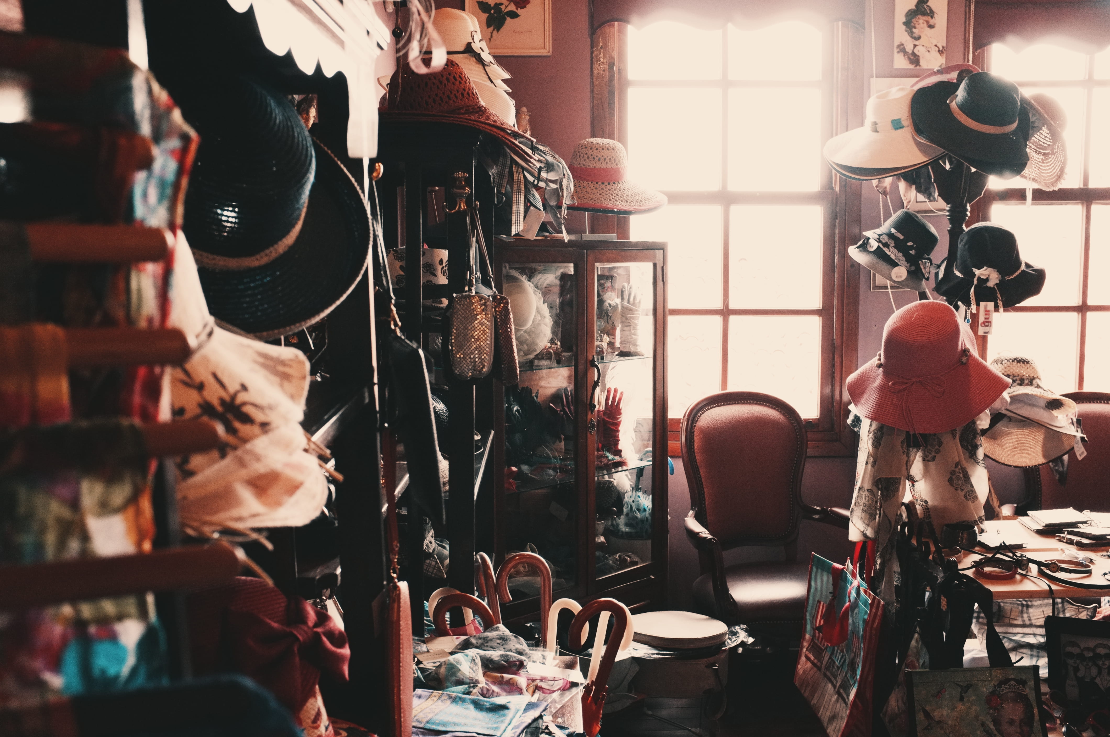 one Person, umbrella, daytime, large group of objects, interior, 4K, hats, occupation, workshop, people, hat, market, inside, brand, lighting equipment, HD Wallpaper